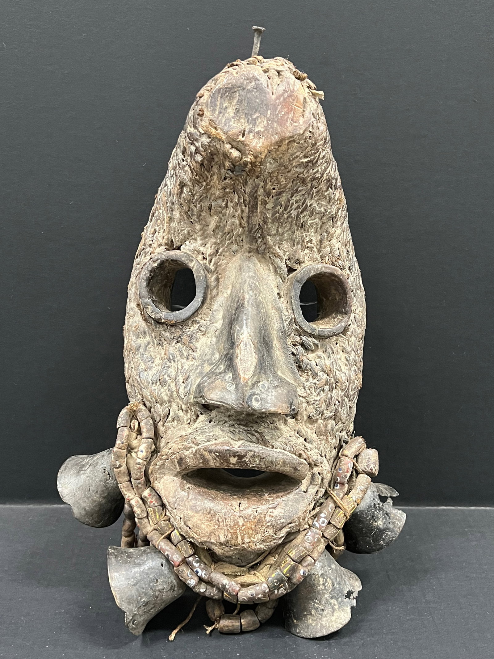Carved Wood Guere Mask: African Tribal Art Carved Wood Guere Mask. The dimension is 16 inches high x 11 inches wide. Please be aware that some of the items are vintage, secondhand, old ages, antiques and may have a defects