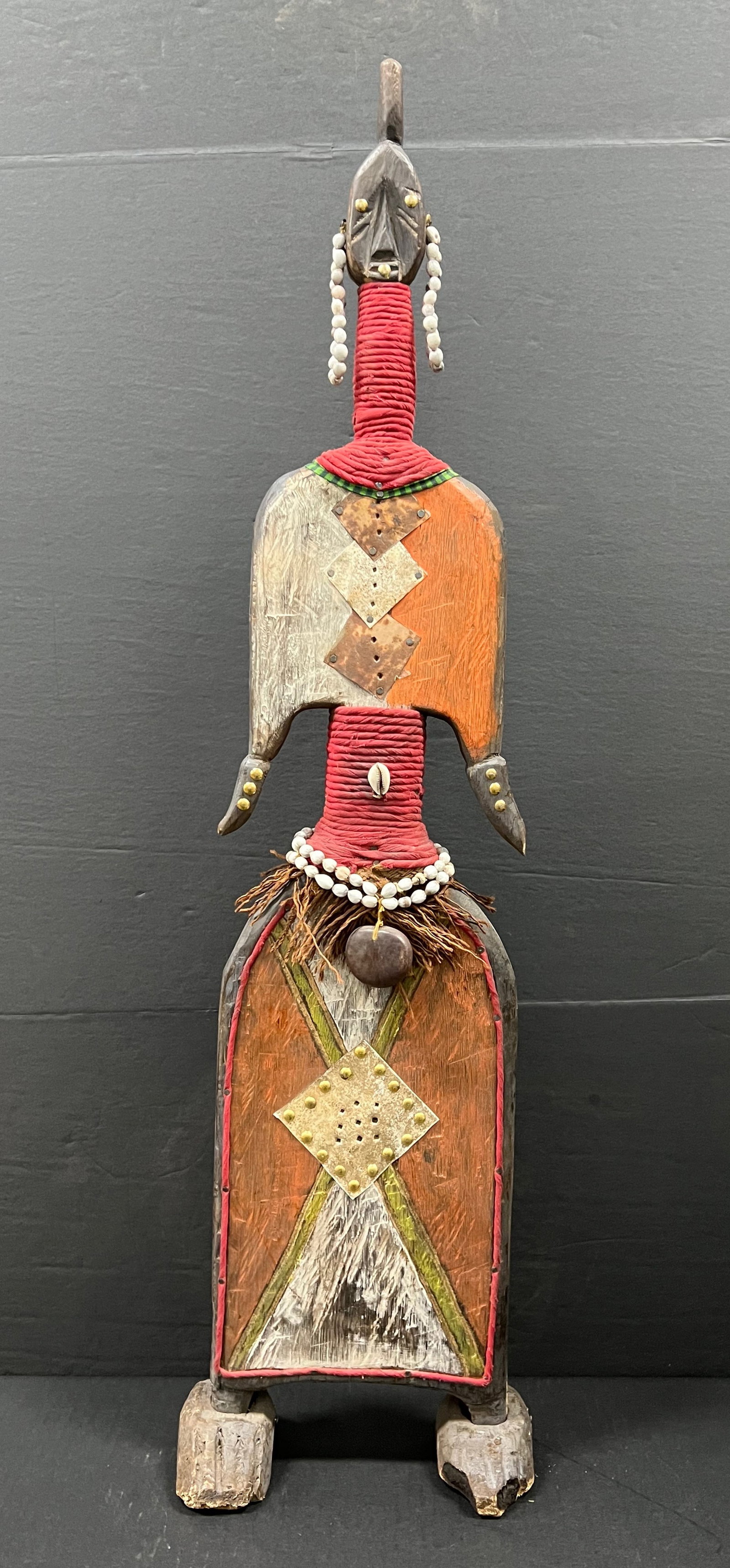 Carved Wood Large Namji Beaded Doll: African Tribal Art Carved Wood Large Namji Beaded Doll. The dimension is 35.5 inches high x 8 inches wide. Please be aware that some of the items are vintage, secondhand, old ages, antiques and may ha