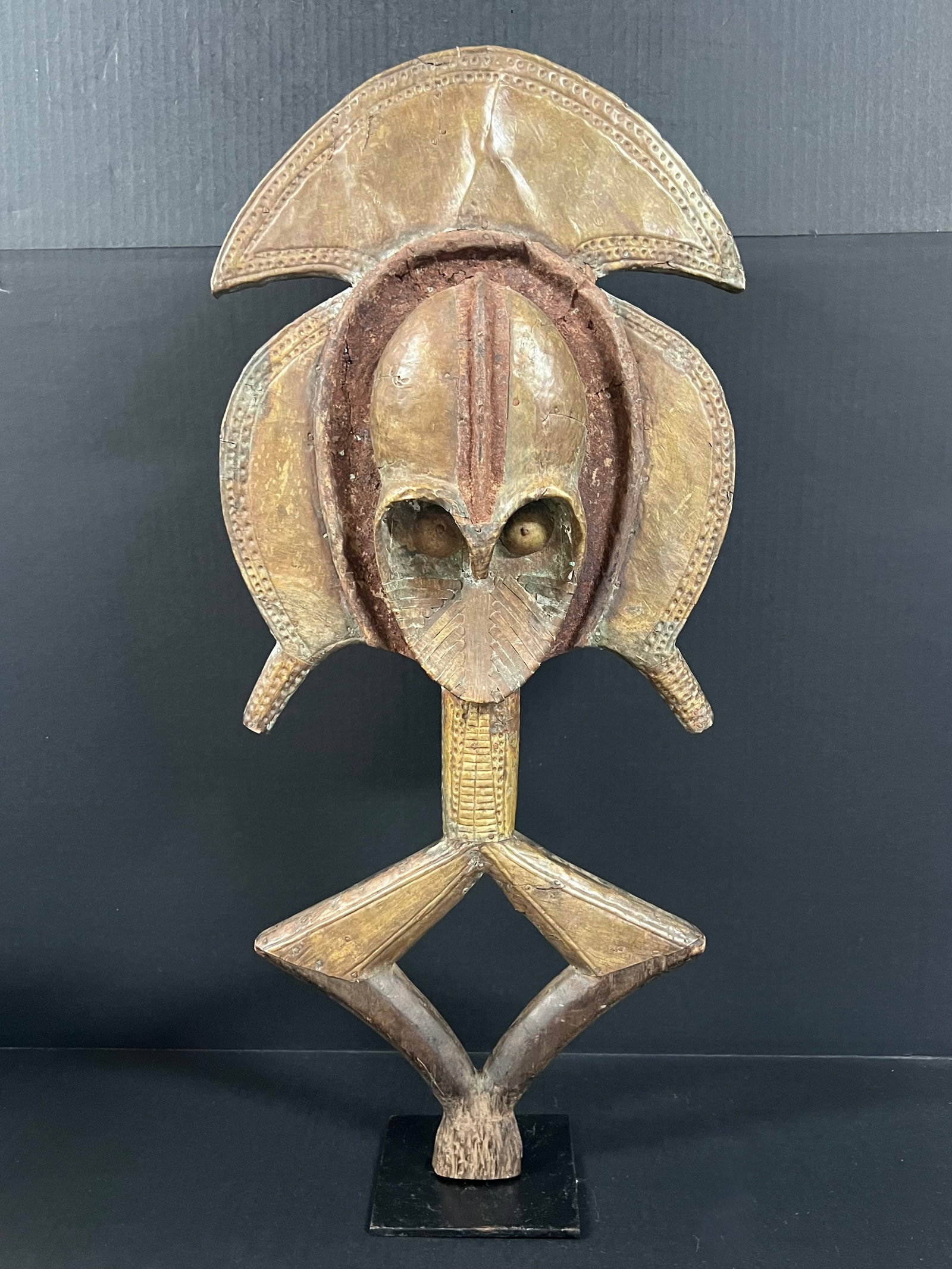 Bacota Reliquary Guardian: African Tribal Art Bacota Reliquary Guardian. The dimension is 28 inches high x 12.5 inches wide. Please be aware that some of the items are vintage, secondhand, old ages, antiques and may have a