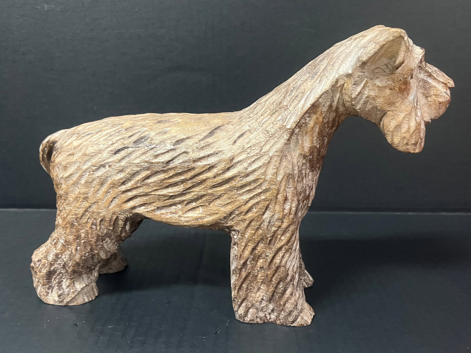 Carved Wood Dog Sculpture: Folk Art Carved Wood Dog Sculpture. The dimension is 8.5 inches high x 12.5 inches depth X 3.25 inches wide. Please be aware that some of the items are vintage, secondhand, old ages, antiques and may 