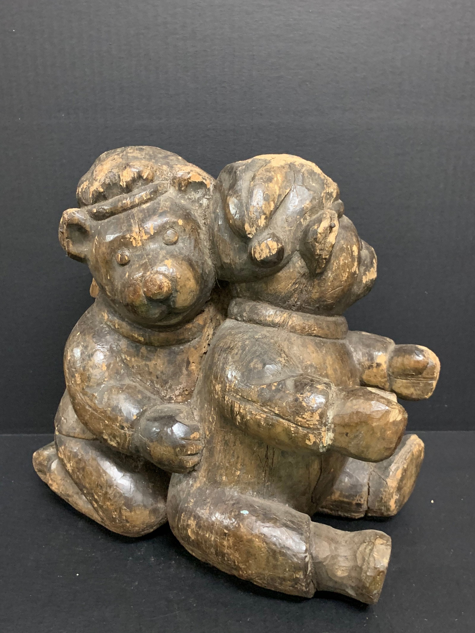 Hand Carved Wooden Bear Cub Sculpture: Folk Art Hand Carved Wood Bear Cub Sculpture. The dimension is 12 inches high x 13 inches wide. Please be aware that some of the items are vintage, secondhand, old ages, antiques and may have a defect