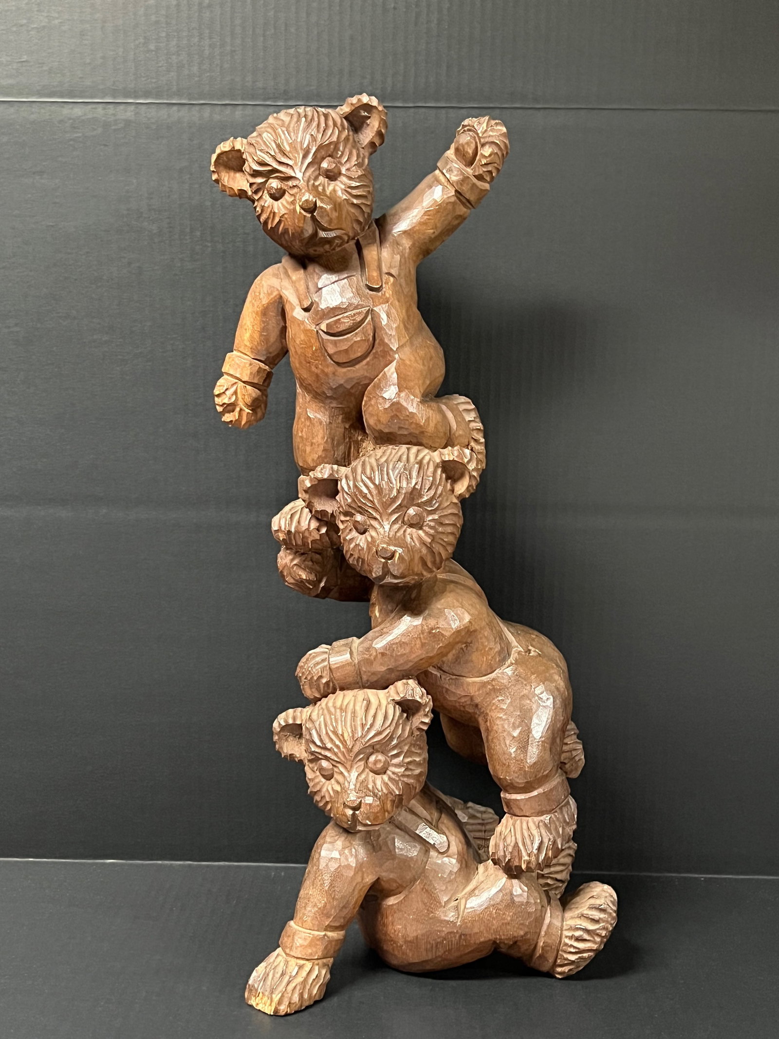 Hand Carved Wooden Acrobatic Three Teddy Bear Sculpture: Folk Art Hand Carved Wood Acrobatic Threee Teddy Bear Sculpture. The dimension is 18 inches high x 8 inches wide. Please be aware that some of the items are vintage, secondhand, old ages, antiques and
