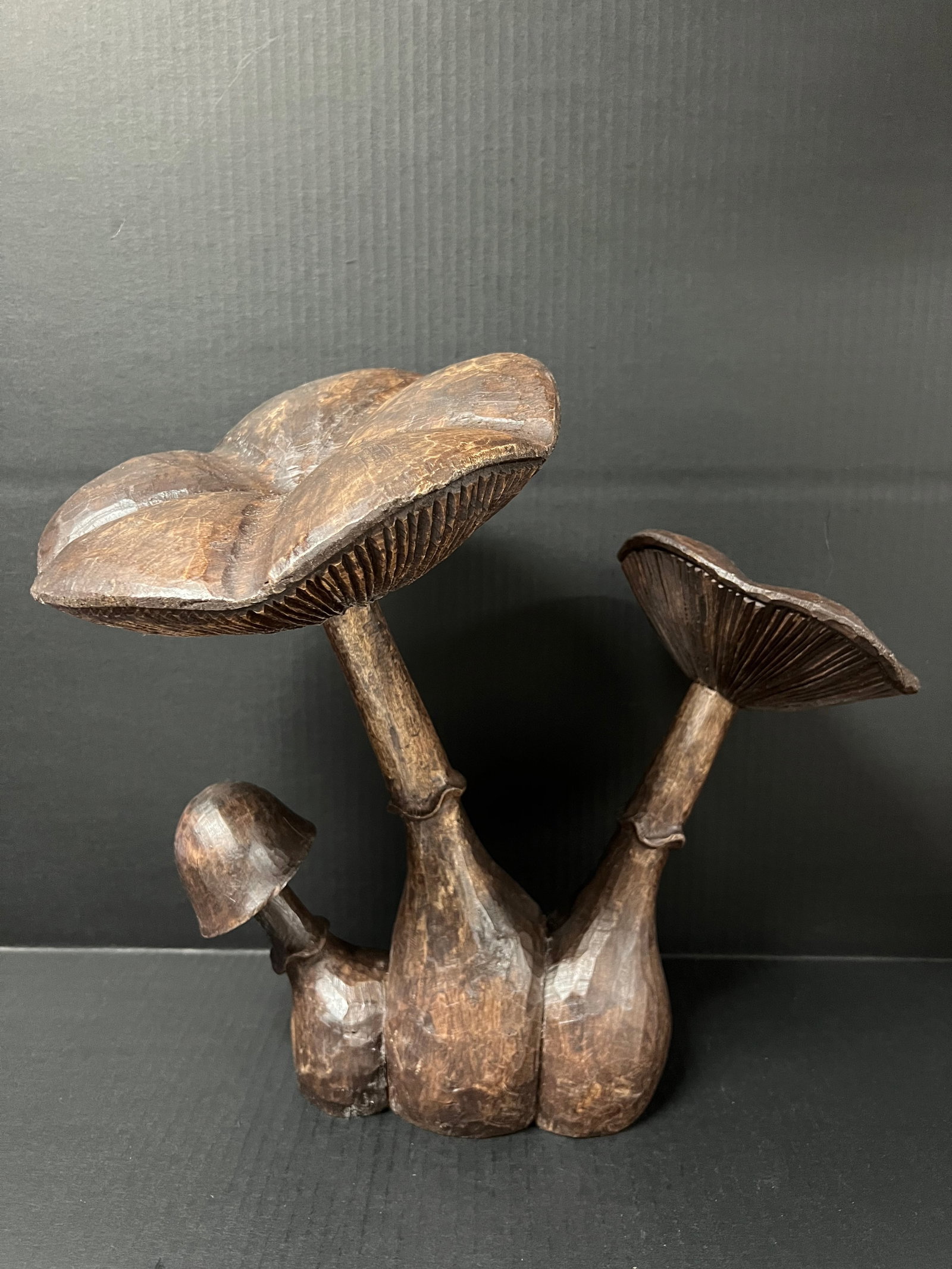 Hand Carved Wooden Mushroom Sculpture: Folk Art Hand Carved Wood Mushroom Sculpture. The dimension is 15 inches high x 9.5 inches wide. Please be aware that some of the items are vintage, secondhand, old ages, antiques and may have a defec