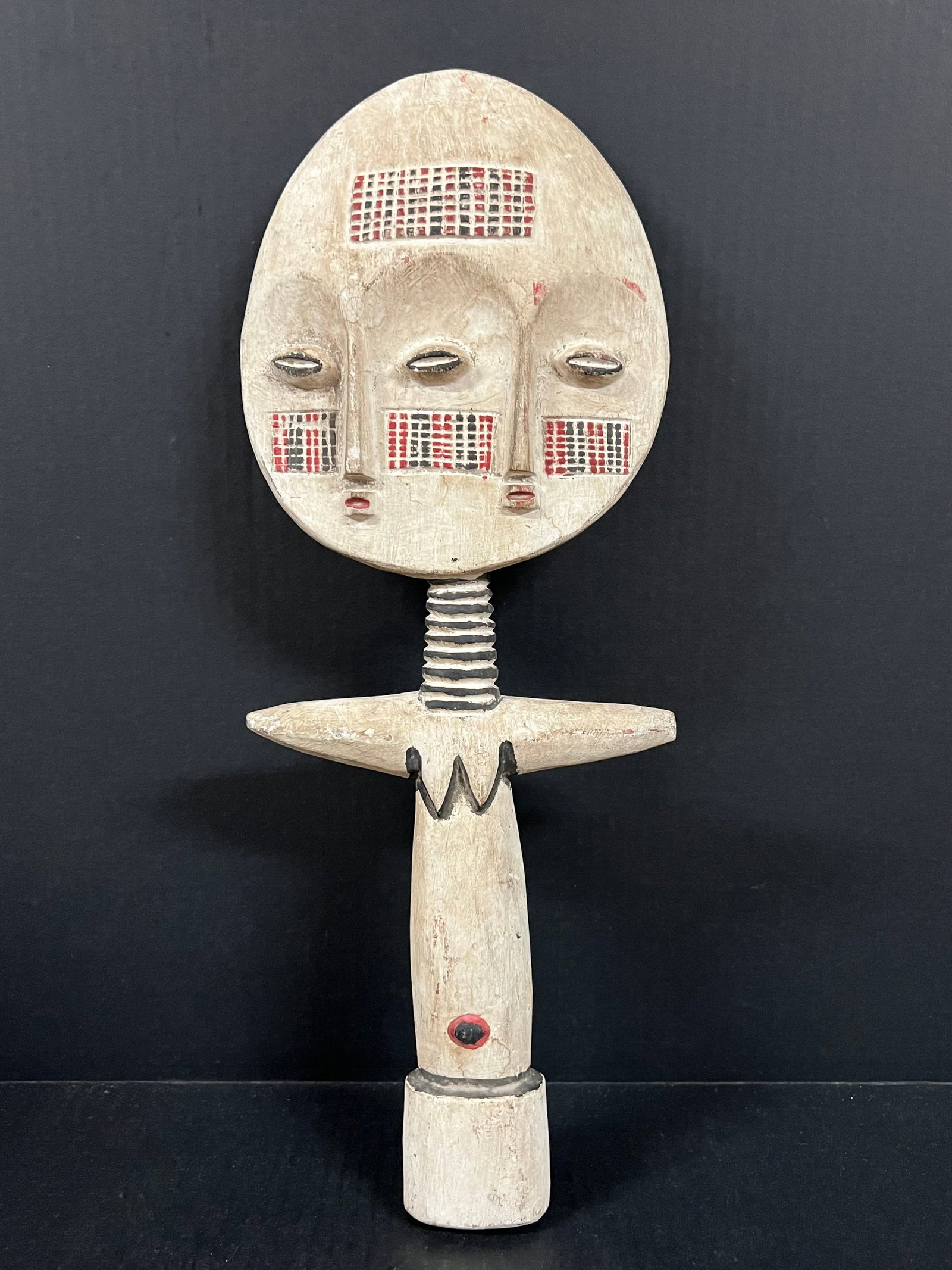 Ashanti Doll: African Tribal Art Ashanti Doll. The dimension is 19,75 inches high x 7.5 inches wide. Please be aware that some of the items are vintage, secondhand, old ages, antiques and may have a defects or sign