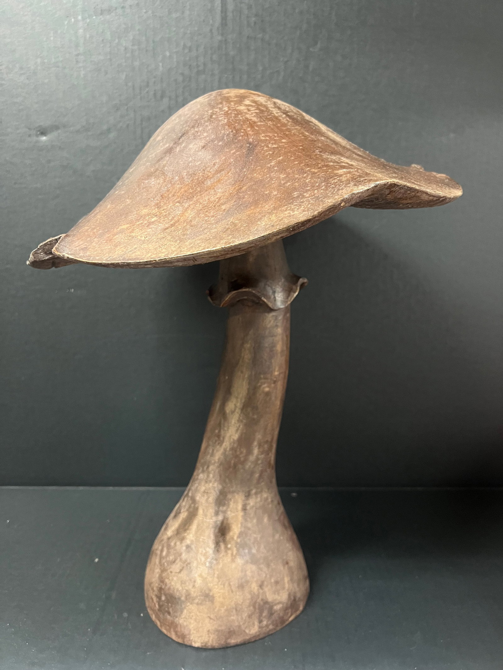 Hand Carved Wooden Large Mushroom Sculpture: Folk Art Hand Carved Wood Large Mushroom Sculpture. The dimension is 18 inches high x 14 inches wide. Please be aware that some of the items are vintage, secondhand, old ages, antiques and may have a 