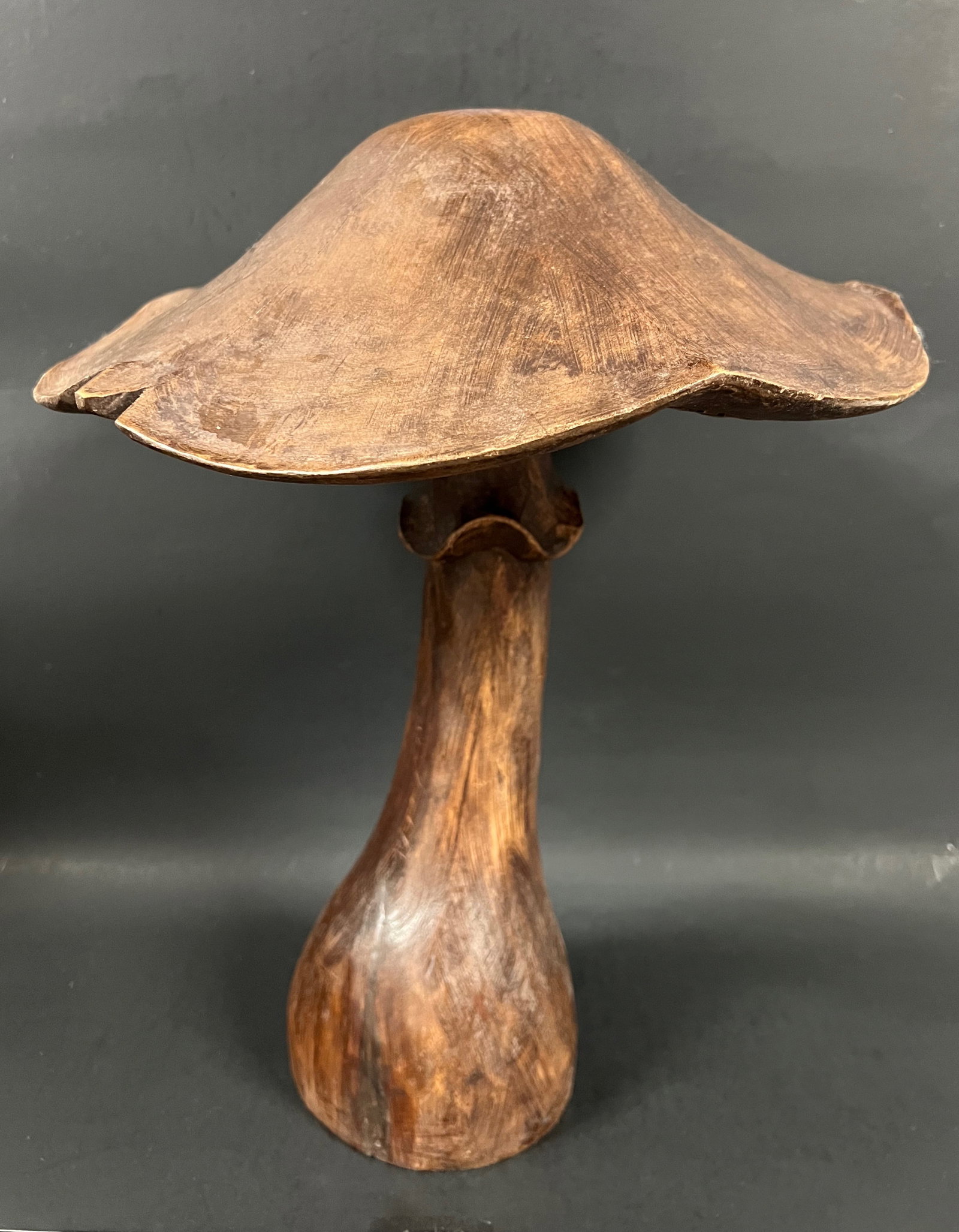 Hand Carved Wooden Mushroom Sculpture: Folk Art Hand Carved Wooden Mushroom Sculpture. The dimension is 12 inches high x 15 inches wide. Please be aware that some of the items are vintage, secondhand, old ages, antiques and may have a defe