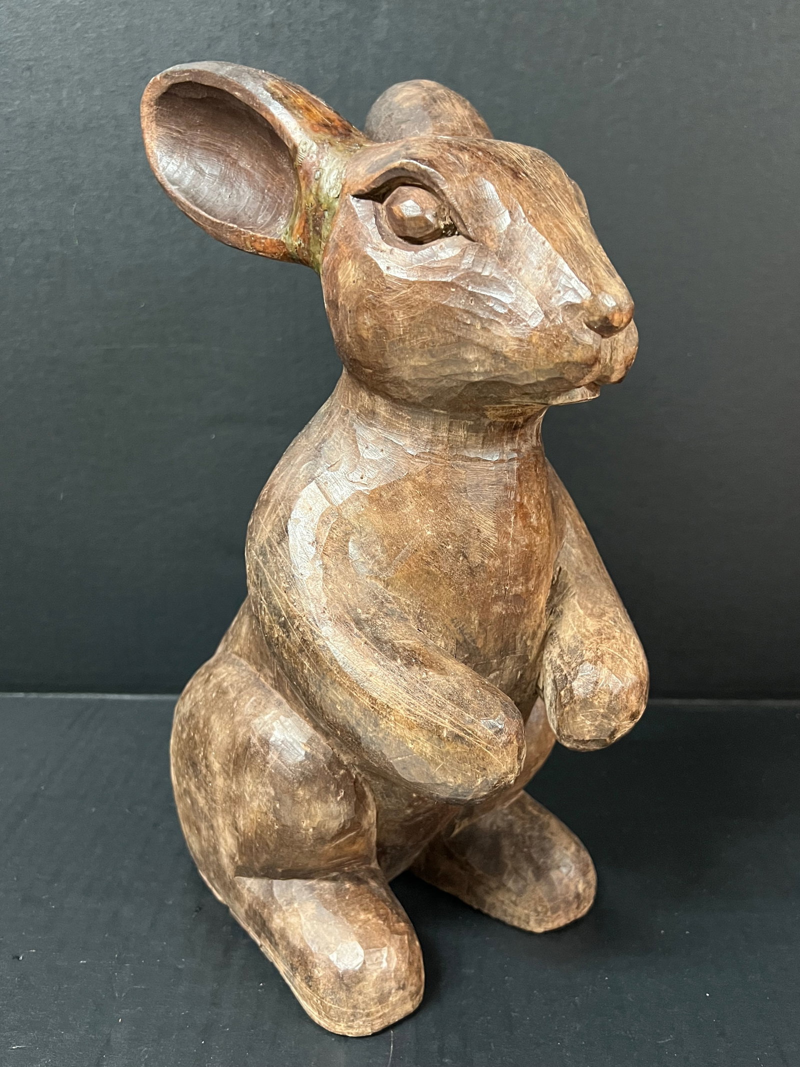 Hand Carved Wooden Rabbit Sculpture: Folk Art Hand Carved Wooden Rabbit Sculpture. The dimension is 13 inches high x 9.5 inches wide. Please be aware that some of the items are vintage, secondhand, old ages, antiques and may have a defec