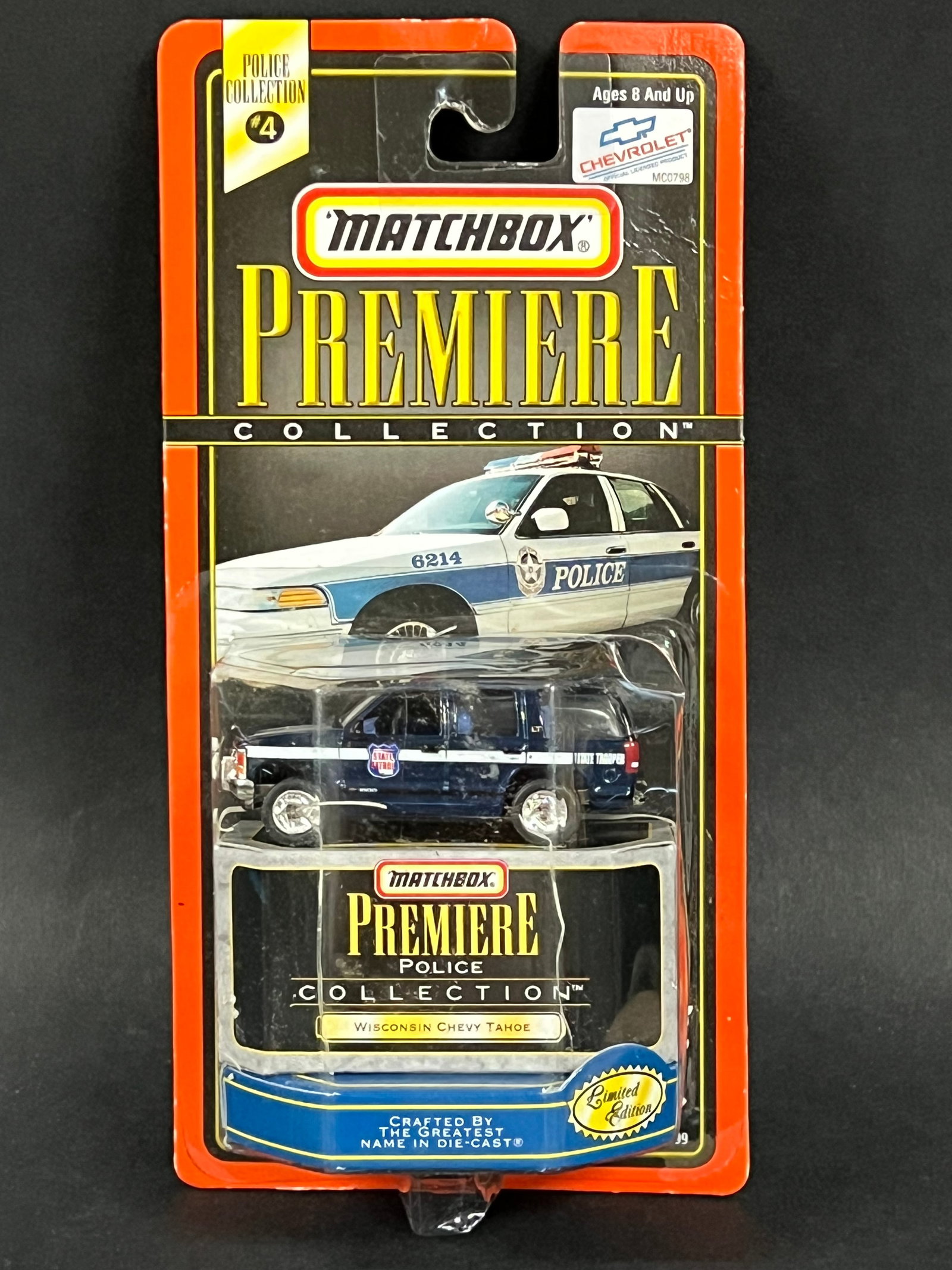 1:64 Scale Die Cast Collector Racing Car: 1:64 Scale Die Cast Collector MATCHBOX POLICE CAR Original Sealed Packaging. The dimension is 8.5 inches high x 4.25 inches wide. Please be aware that some of the items are vintage, secondhand, old ag