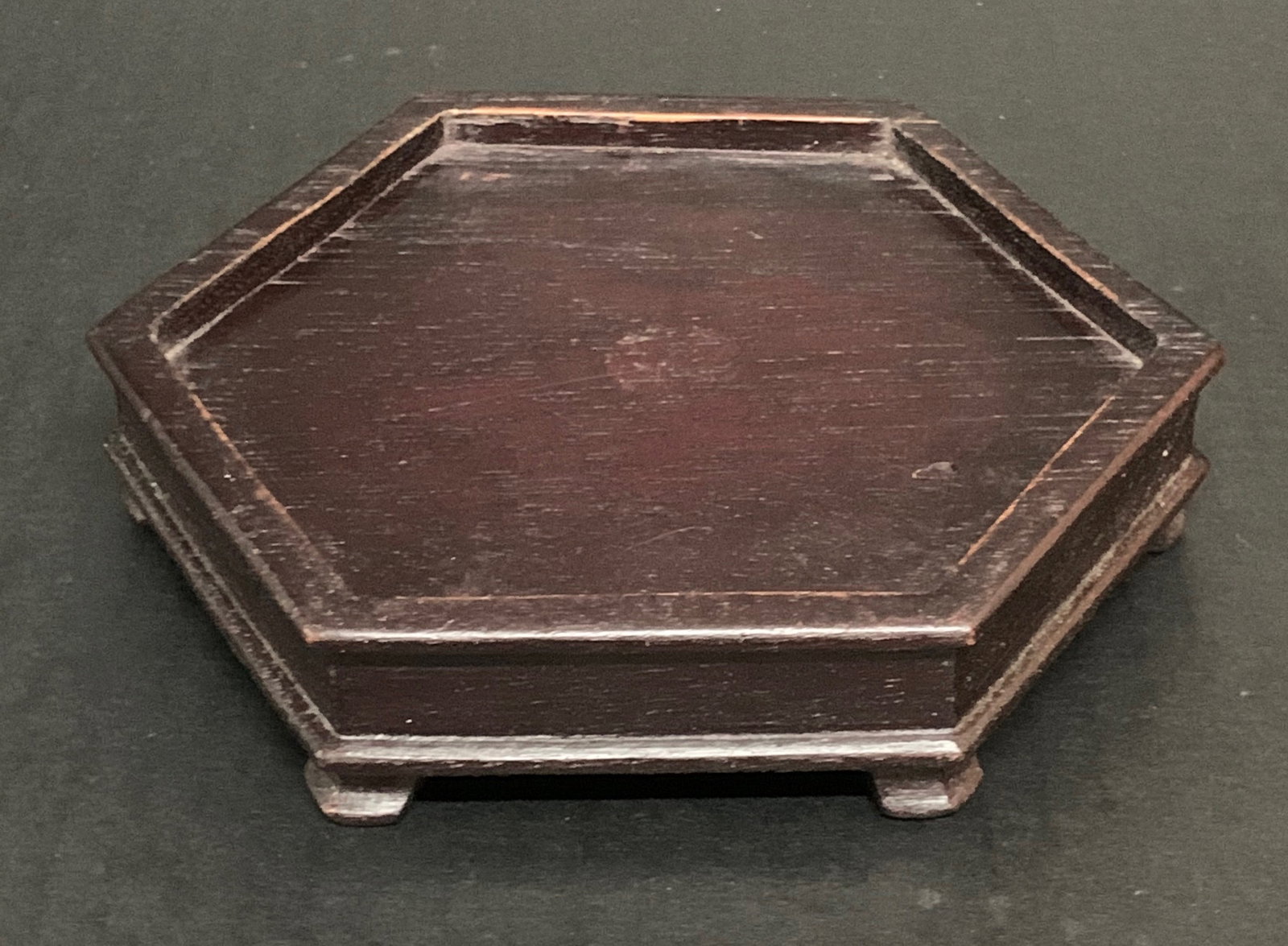 Chinese Art Carved Wooden Display Base: Chinese Art Carved Wooden Display Base. The dimension is 1.25 inches high x 6 inches wide. Please be aware that some of the items are vintage, secondhand, old ages, antiques and may have a defects or 