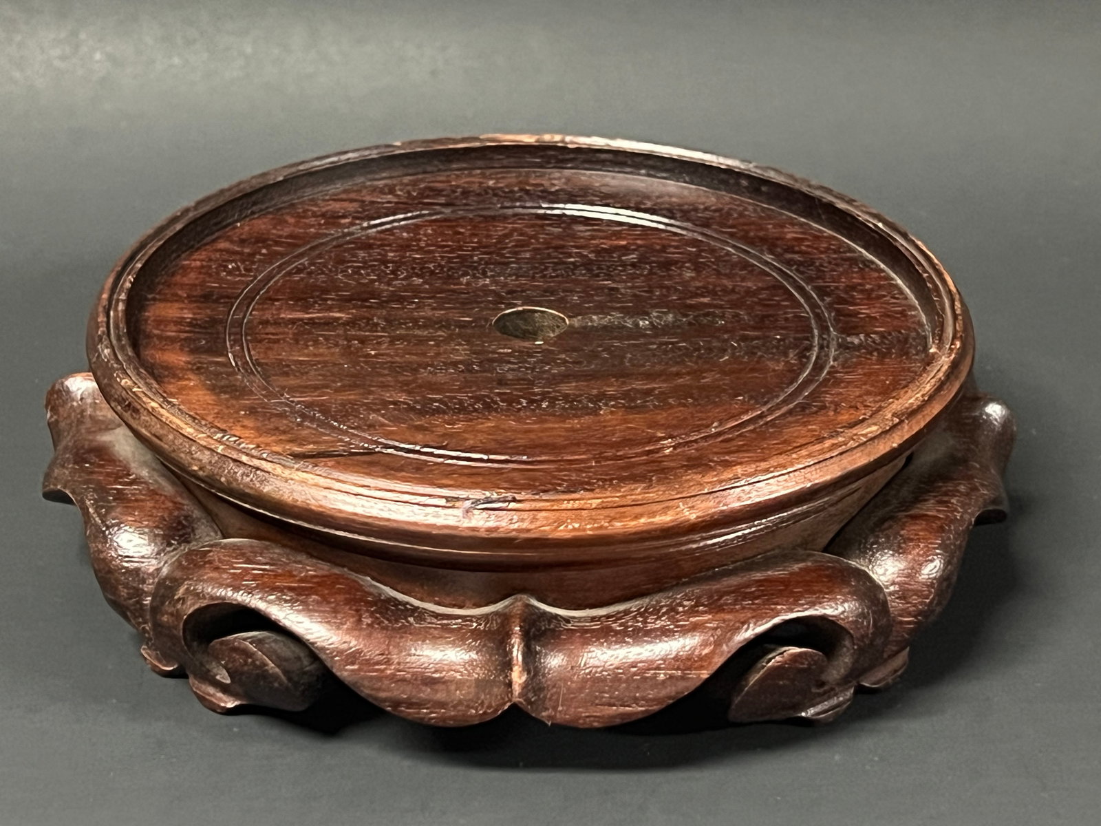 Chinese Art Carved Wooden Display Base: Chinese Art Carved Wooden Display Base. The dimension is 2 inches high x 6.75 inches wide. Please be aware that some of the items are vintage, secondhand, old ages, antiques and may have a defects or 