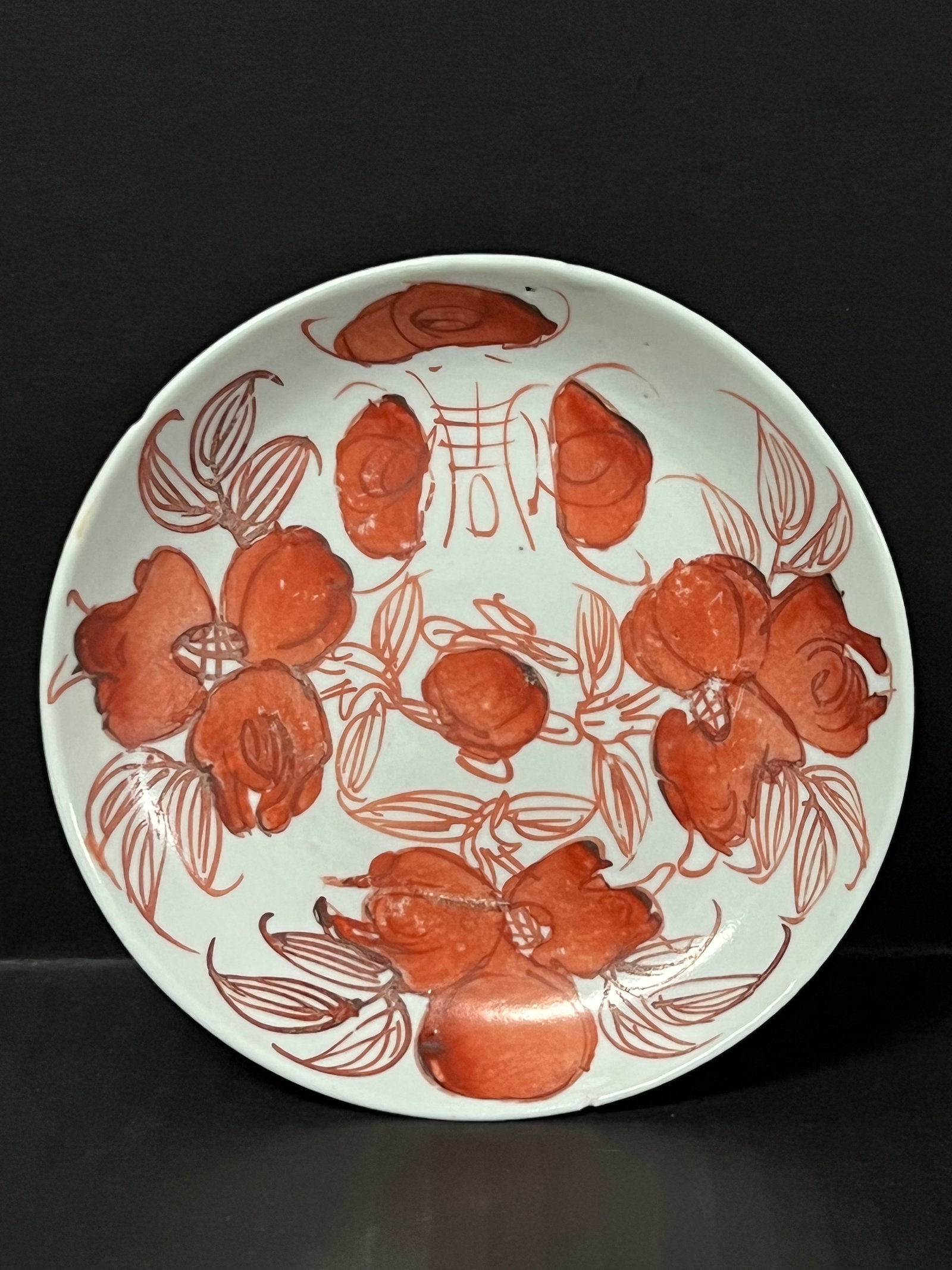 Chinese Art Porcelain Copper Red Saucer: Chinese Art Porcelain Copper Red Saucer. The dimension is 6 inches high x 6 inches wide. Please be aware that some of the items are vintage, secondhand, old ages, antiques and may have a defects or si