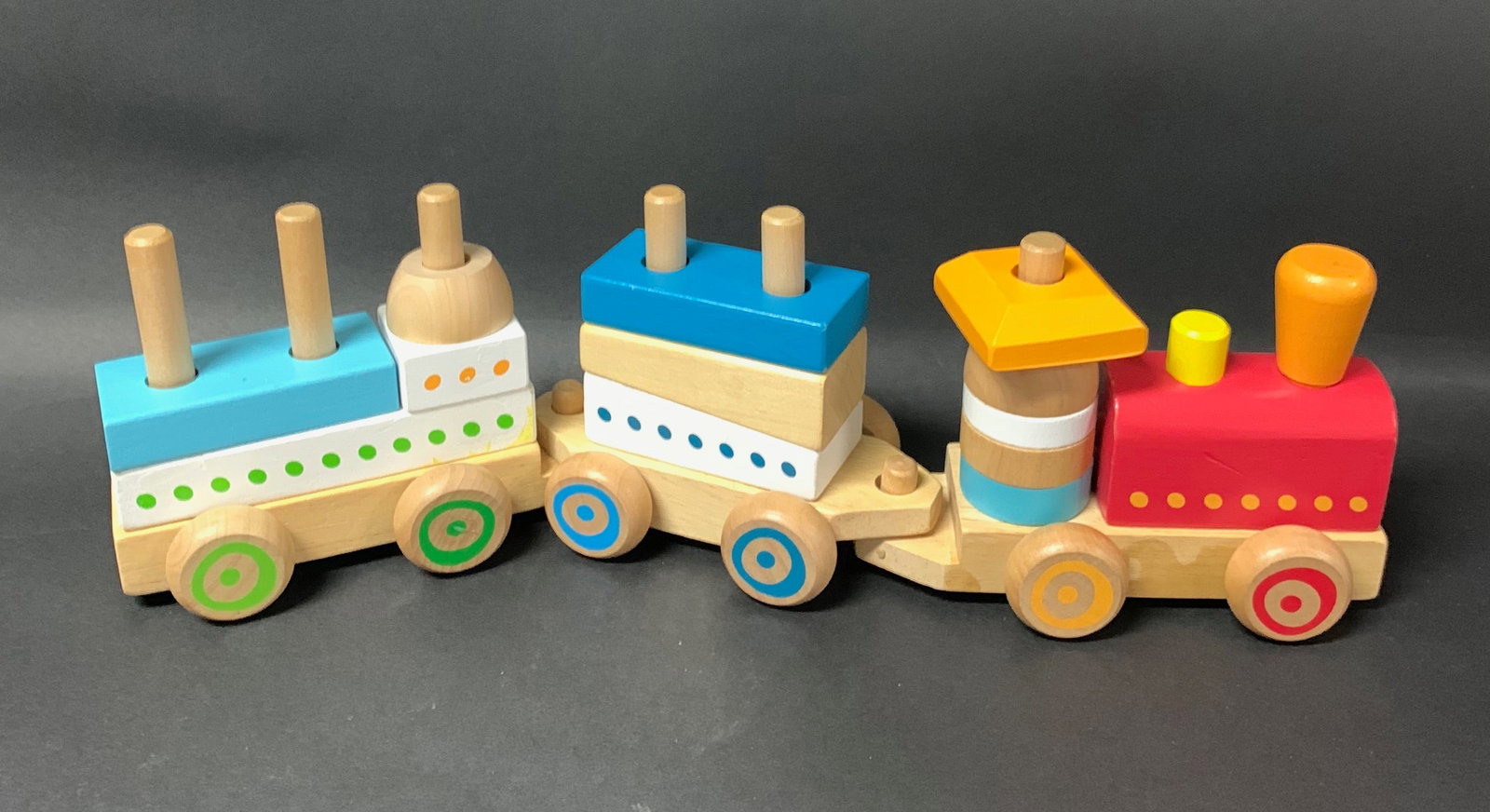 Carved Wooden Painted Stacking Train Toy: Carved Wooden Painted Stacking Train Toy. The dimension is 5 inches high x 17 inches wide. Please be aware that some of the items are vintage, secondhand, old ages, antiques and may have a defects or 