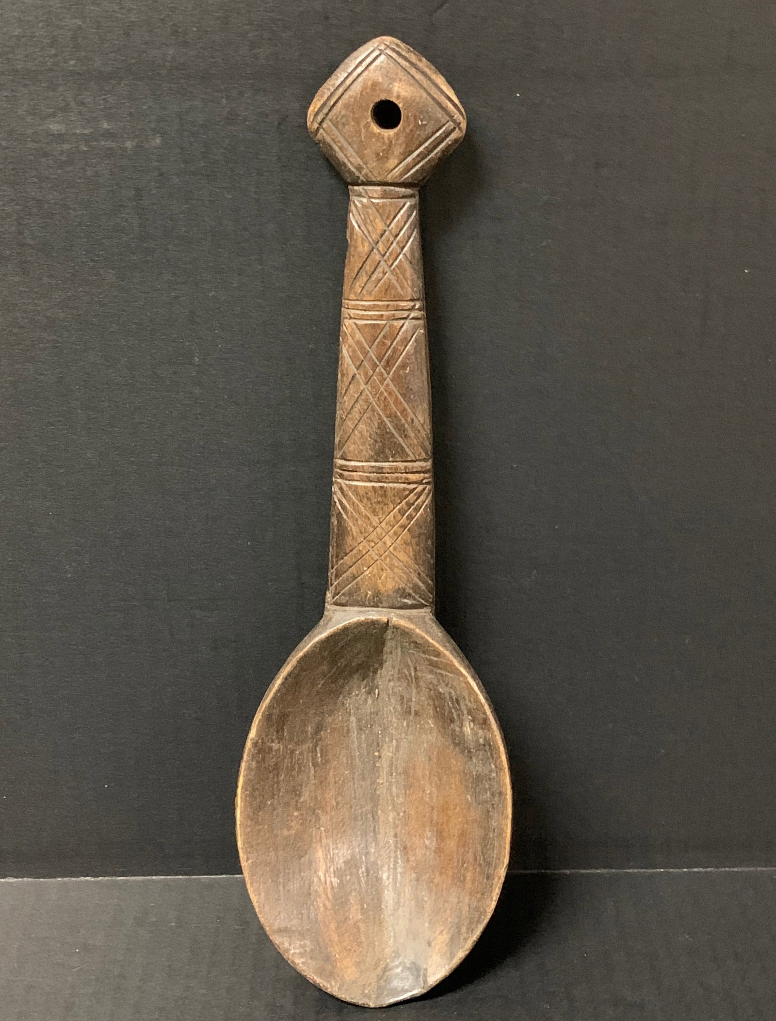 African Tribal Art Carved Wood Kuba Spoon: African Tribal Art Carved Wood Kuba Spoon. The dimension is 13 inches high x 5 inches wide. Please be aware that some of the items are vintage, secondhand, old ages, antiques and may have a defects or