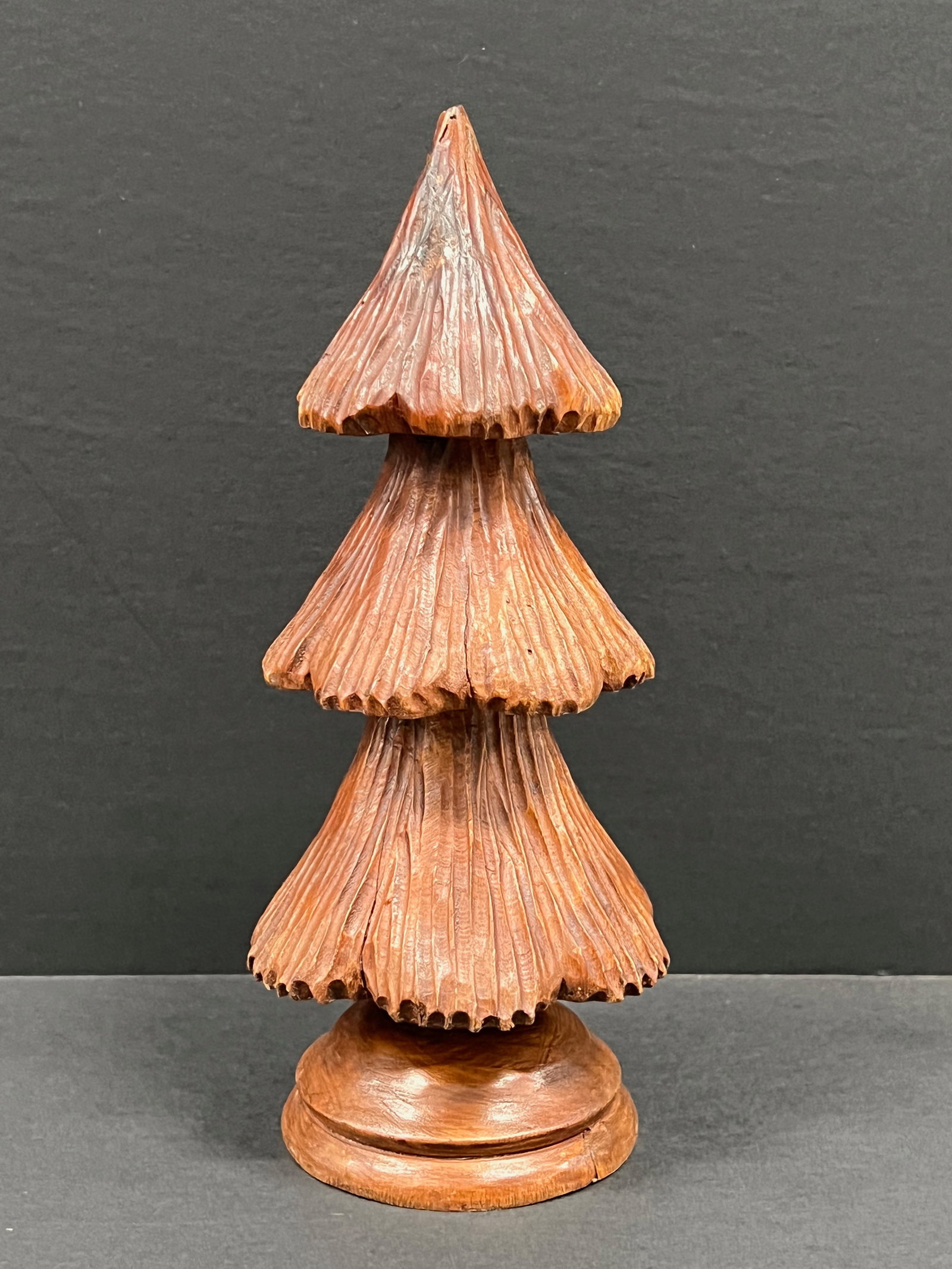Carved Wood Christmas Tree Sculpture: Folk Art Carved Wood Christmas Tree Sculpture. The dimension is 9.25 inches high x 3.5 inches wide. Please be aware that some of the items are vintage, secondhand, old ages, antiques and may have a de