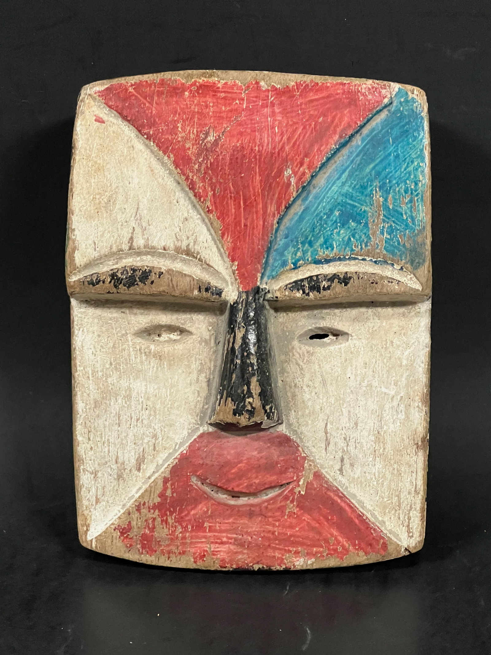 Passport Mask: African Tribal Art Passport Mask. The dimension is 5.5 inches high x 4 inches wide. Please be aware that some of the items are vintage, secondhand, old ages, antiques and may have a defects or sign of