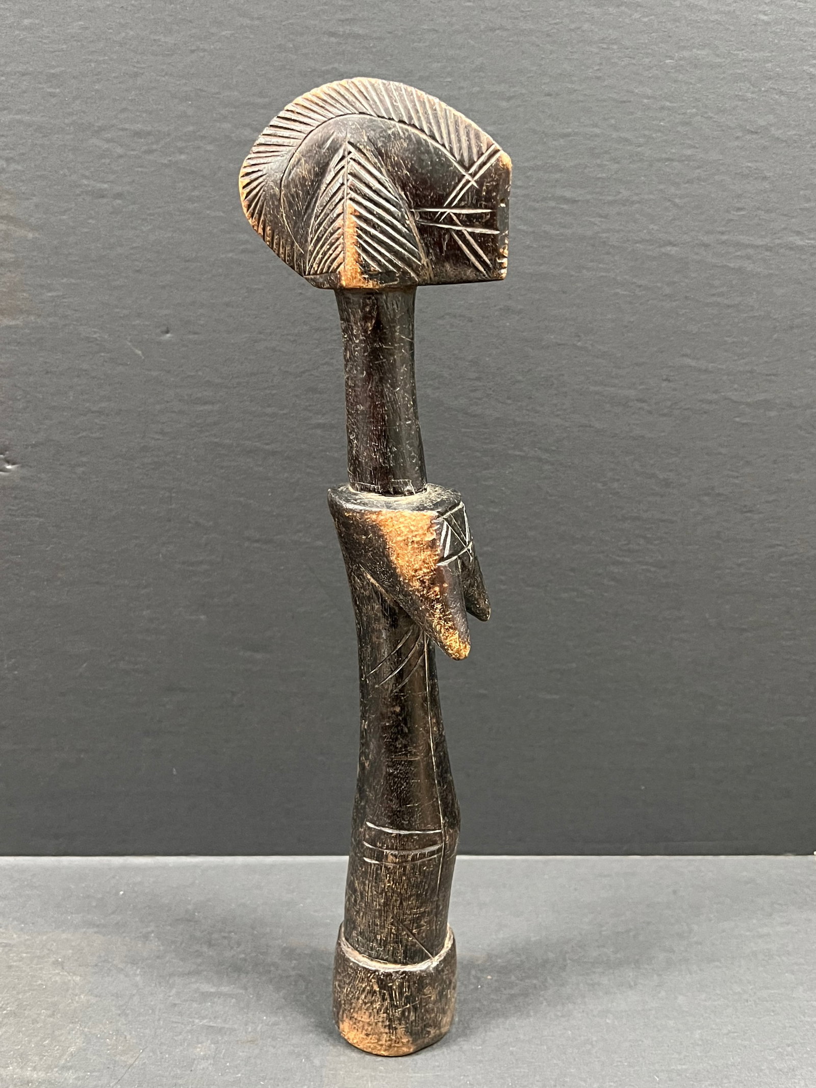 Mossi Fertility Doll: African Tribal Art Mossi Fertility Doll. The dimension is 14.5 inches high x 4 inches wide. Please be aware that some of the items are vintage, secondhand, old ages, antiques and may have a defects