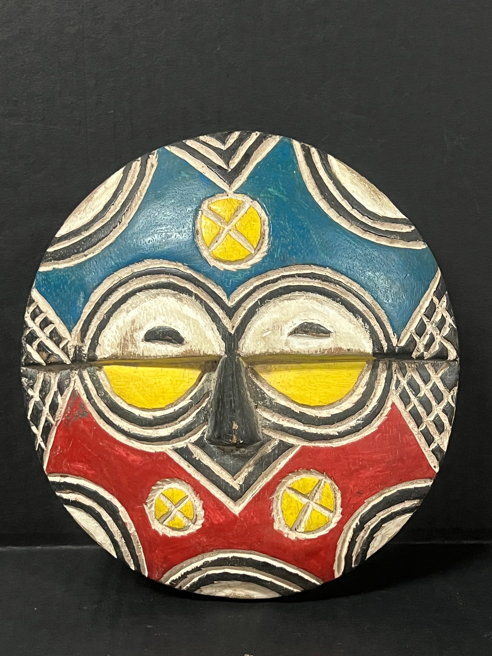 Teke Mask: African Tribal Art Teke Mask. The dimension is 8.25 inches high x 8 inches wide. Please be aware that some of the items are vintage, secondhand, old ages, antiques and may have a defects or sign of ag