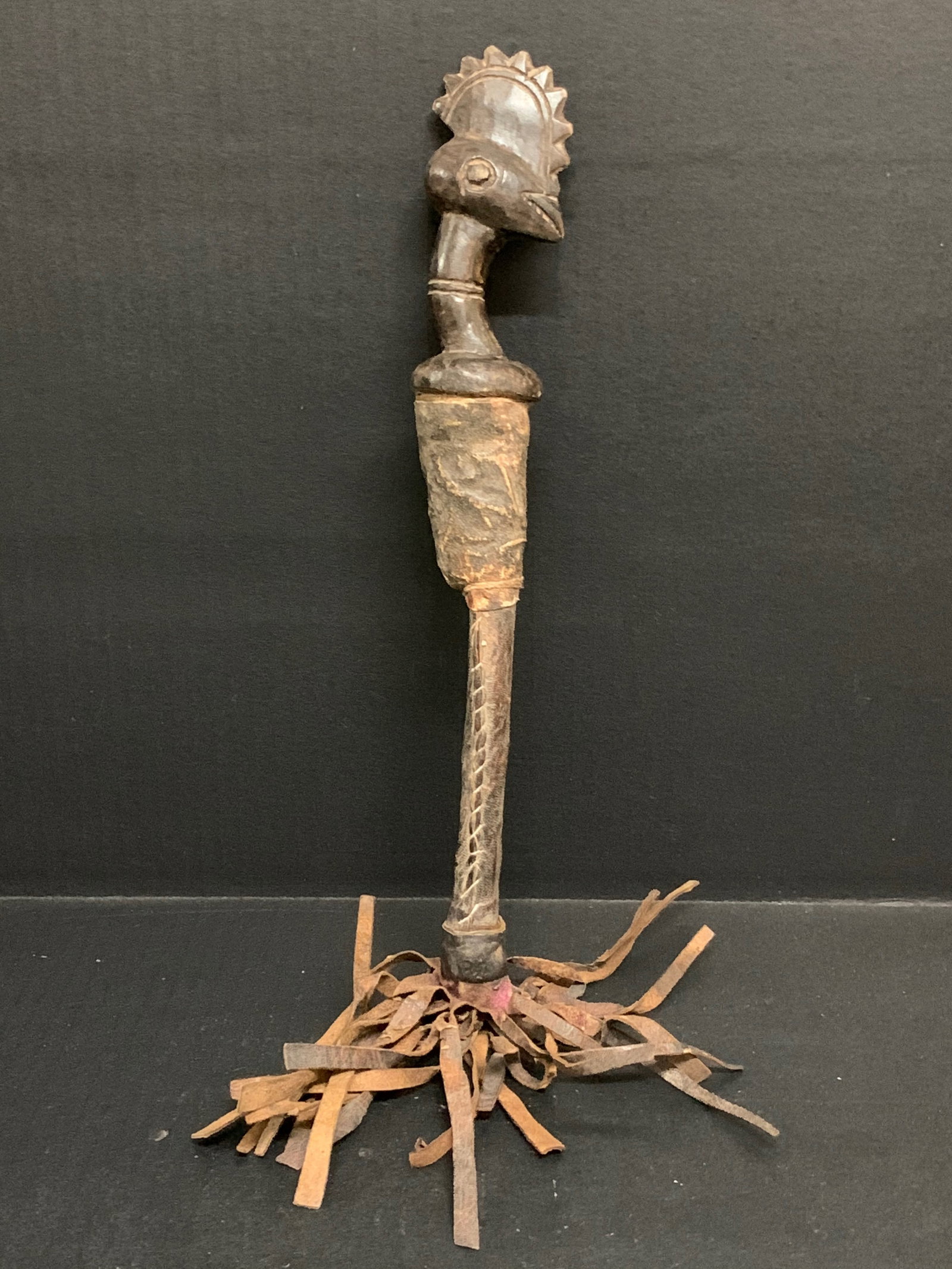 Senufo Whisk: African Tribal Art Senufo Whisk. The dimension is 18 inches high x 2 inches wide. Please be aware that some of the items are vintage, secondhand, old ages, antiques and may have a defects or sign of