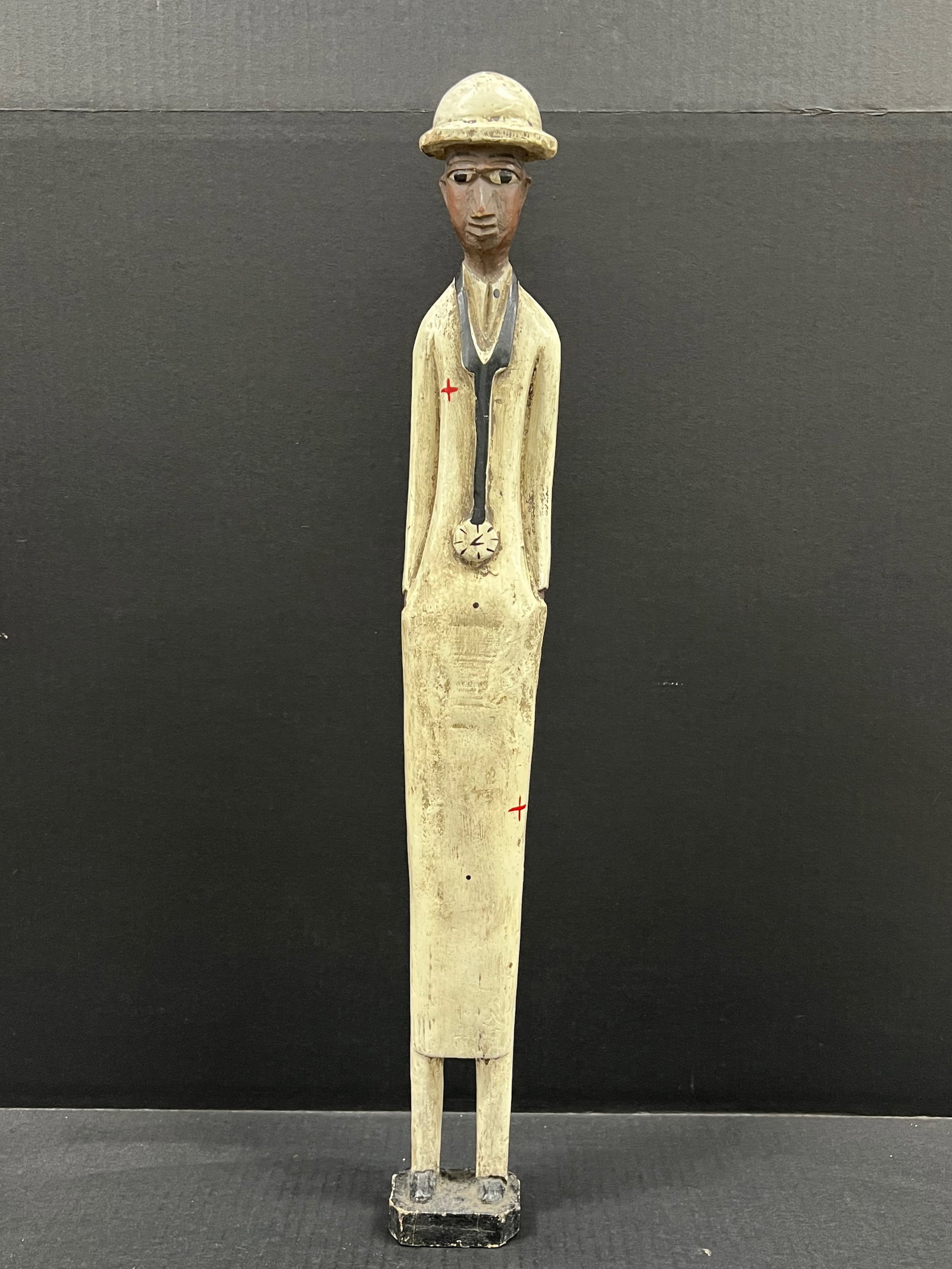 Colonial Statue: African Tribal Art Colonial Statue. The dimension is 23.75 inches high x 2.75 inches wide. Please be aware that some of the items are vintage, secondhand, old ages, antiques and may have a defects or 