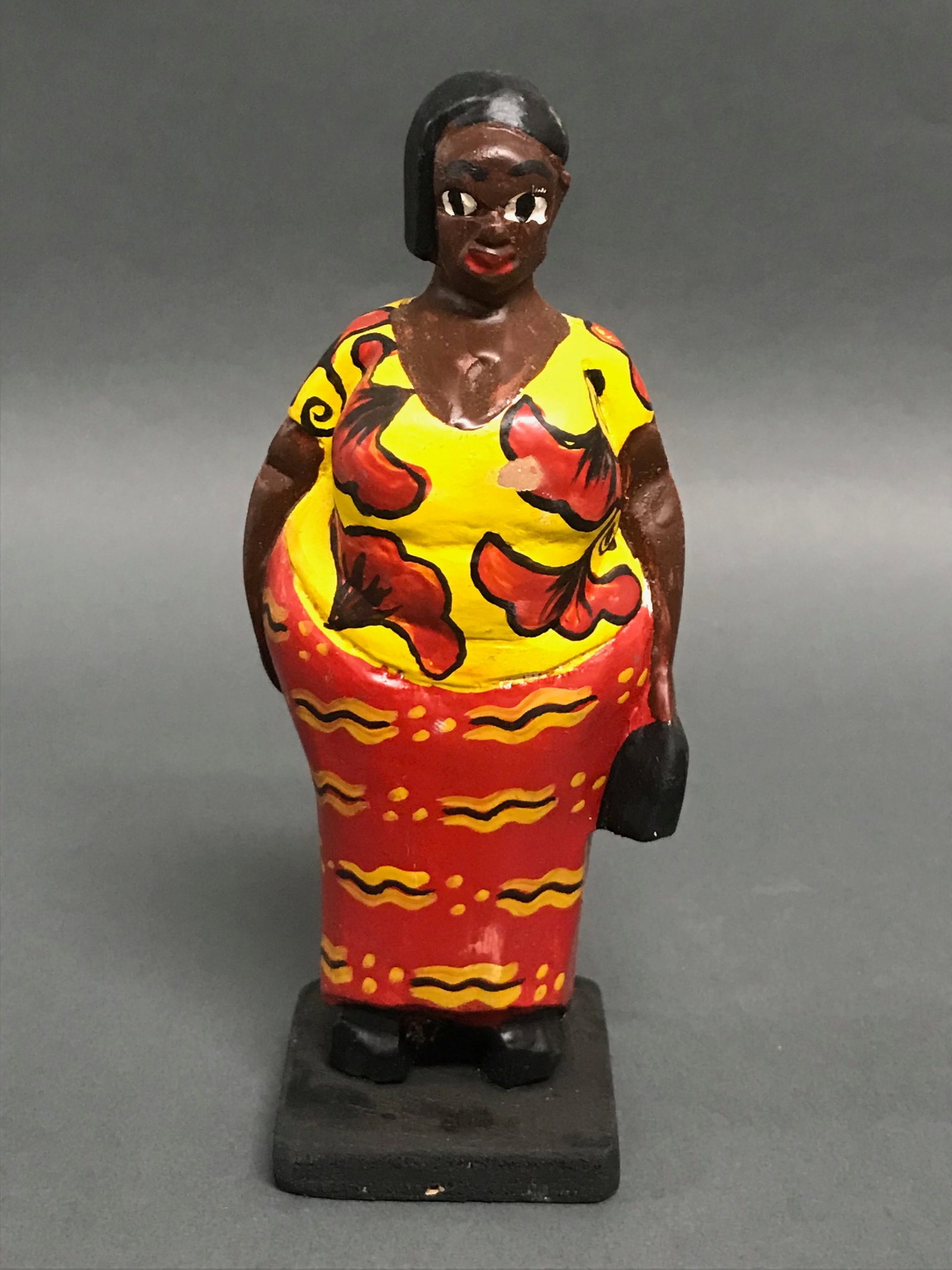 Colonial Statue: African Tribal Art Colonial Statue. The dimension is 6.5 inches high x 2.75 inches wide. Please be aware that some of the items are vintage, secondhand, old ages, antiques and may have a defects or si