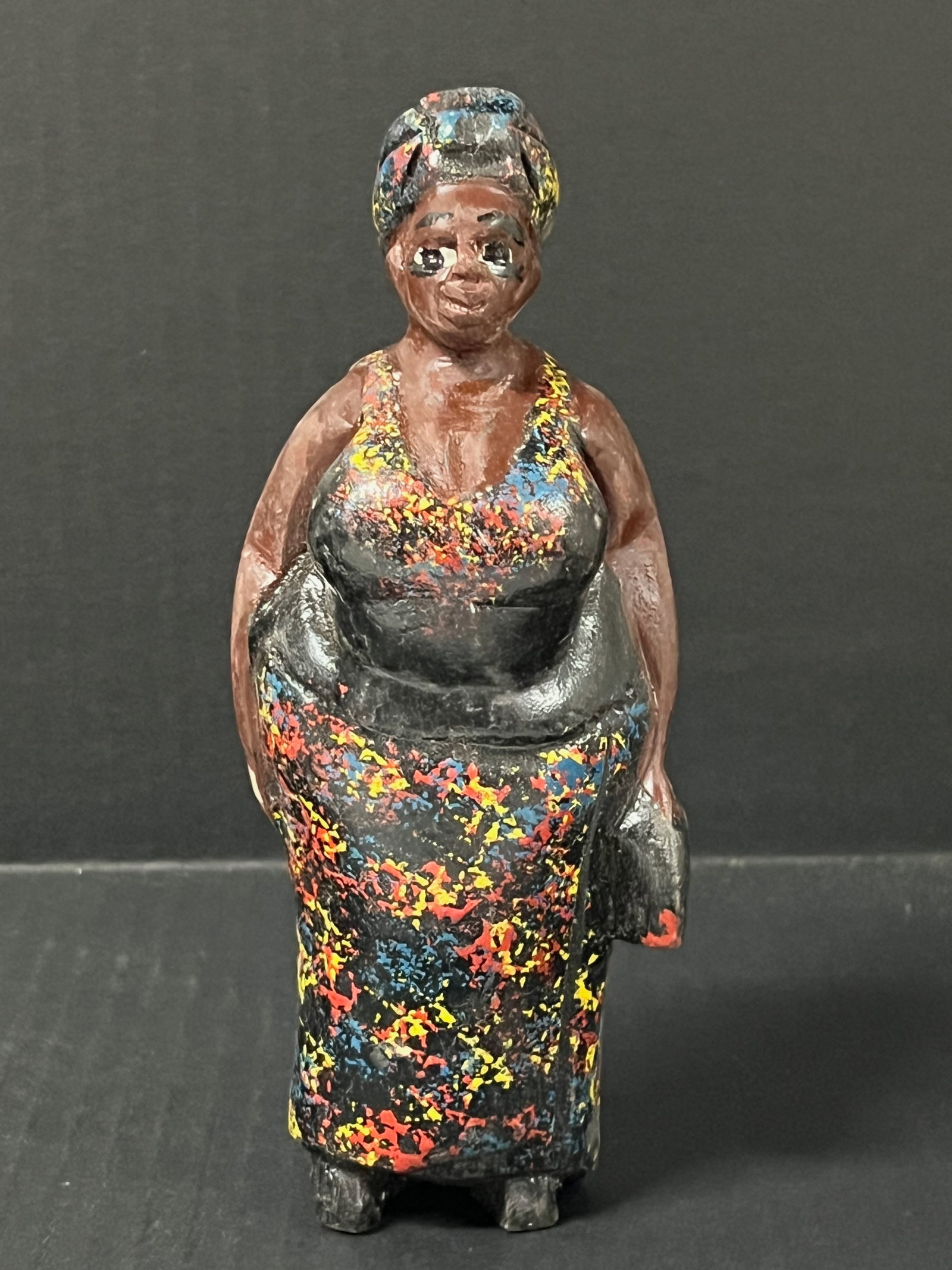 Colonial Statue: African Tribal Art Colonial Statue. The dimension is 7.25 inches high x 2.75 inches wide. Please be aware that some of the items are vintage, secondhand, old ages, antiques and may have a defects or