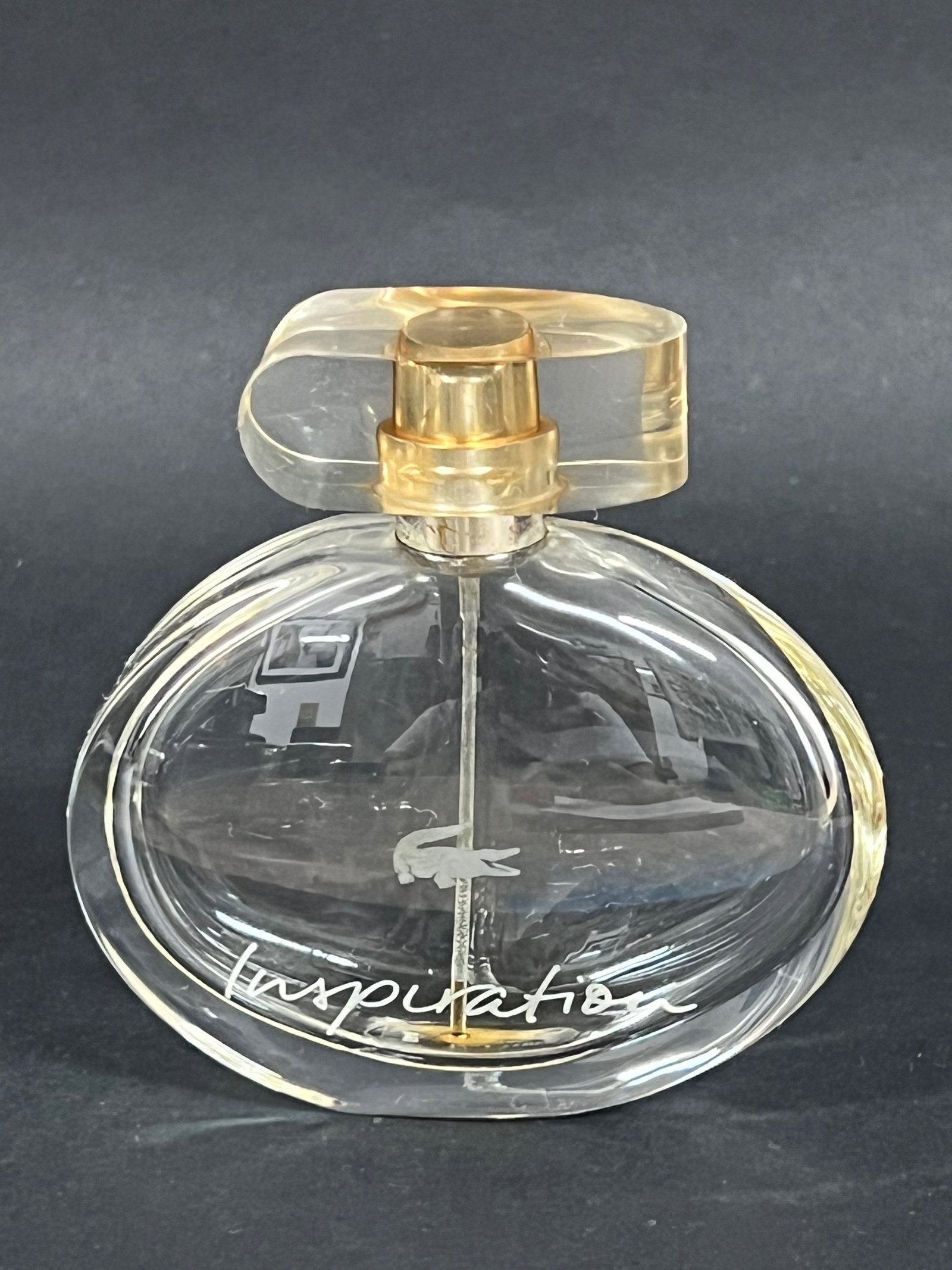 Empty Bottle Only - Lacoste Inspiration Eau De Parfum Bottle: Empty Bottle Only - Lacoste Inspiration Tokyo Eau de Toilette Bottle. The dimension is 3.75 inches high x 3.75 inches wide. Please be aware that some of the items are vintage, secondhand, old ages,