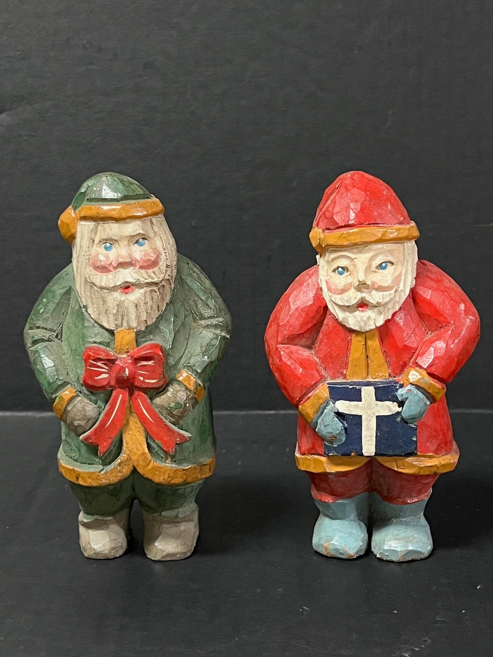 Carved Wood Santa Claus 2 pieces: Folk Art Carved Wood Santa Claus. The dimension is 6 inches high x 3 inches wide. Please be aware that some of the items are vintage, secondhand, old ages, antiques and may have a defects or sign of