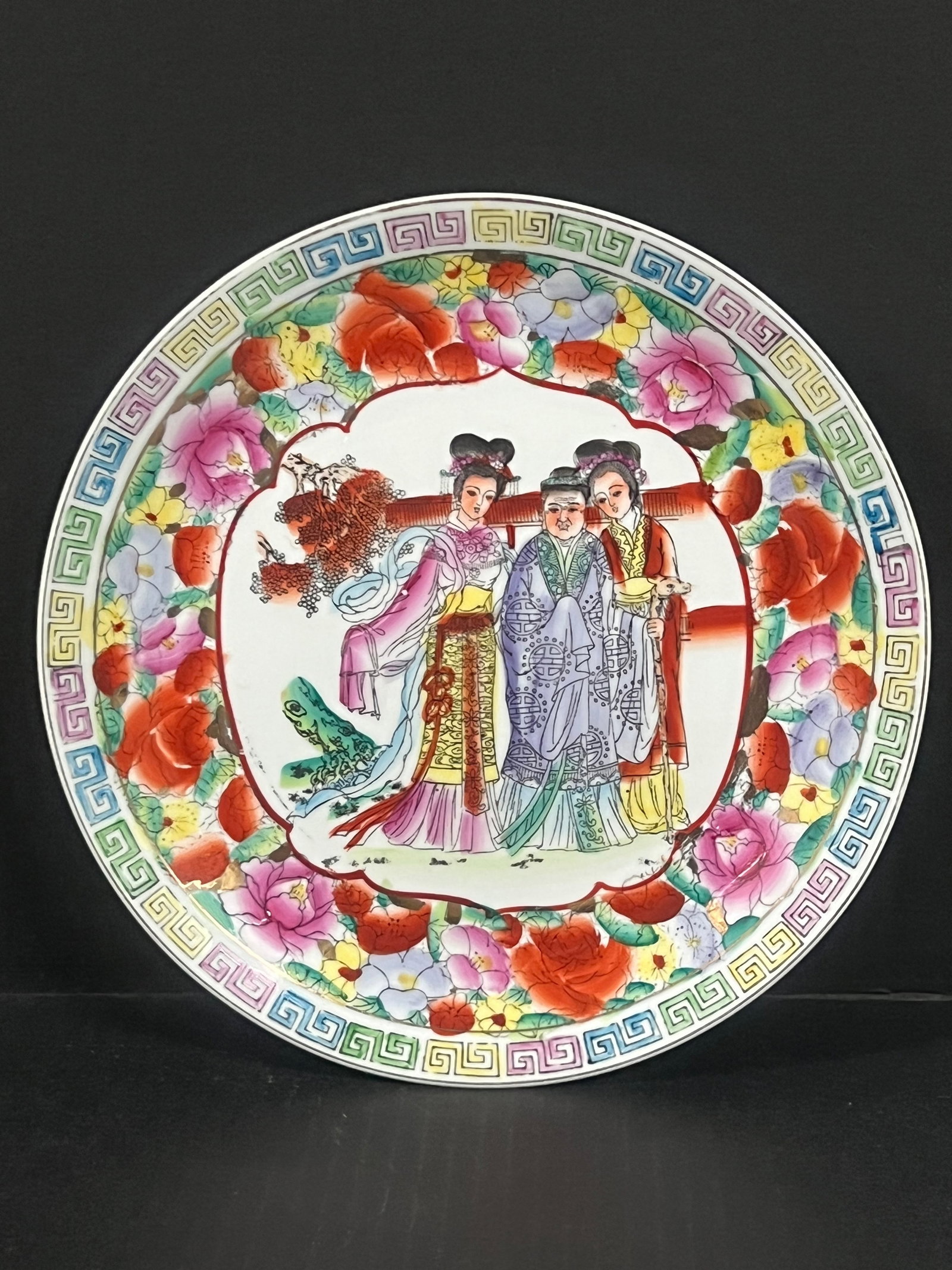 Porcelain Famille Rose Plate: Chinese Art Porcelain Famille Rose Plate. The dimension is 10.25 inches high x 10.25 inches wide. Please be aware that some of the items are vintage, secondhand, old ages, antiques and may have a defe