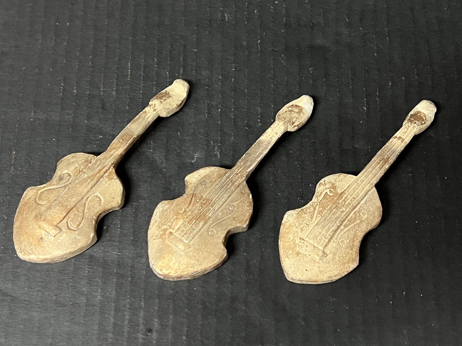 Set of 3 Vintage Carved Wood Miniature Guitar Sculpture: Set of 3 Vintage Carved Wood Miniature Guitar Sculpture. The dimension is 5.5 inches high x 2 inches wide. Please be aware that some of the items are vintage, secondhand, old ages, antiques and may