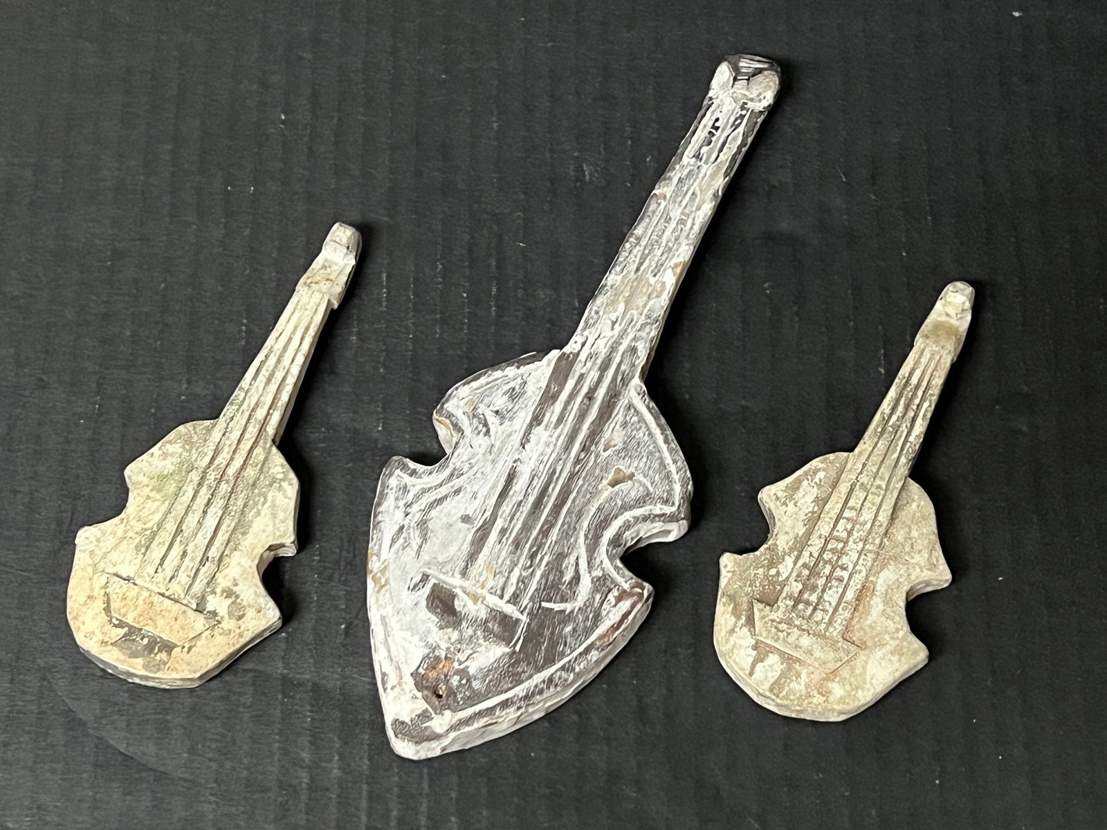 Set of 3 Vintage Carved Wood Miniature Guitar Sculpture: Set of 3 Vintage Carved Wood Miniature Guitar Sculpture. The dimension is 5.5 inches high x 2 inches wide. Please be aware that some of the items are vintage, secondhand, old ages, antiques and may