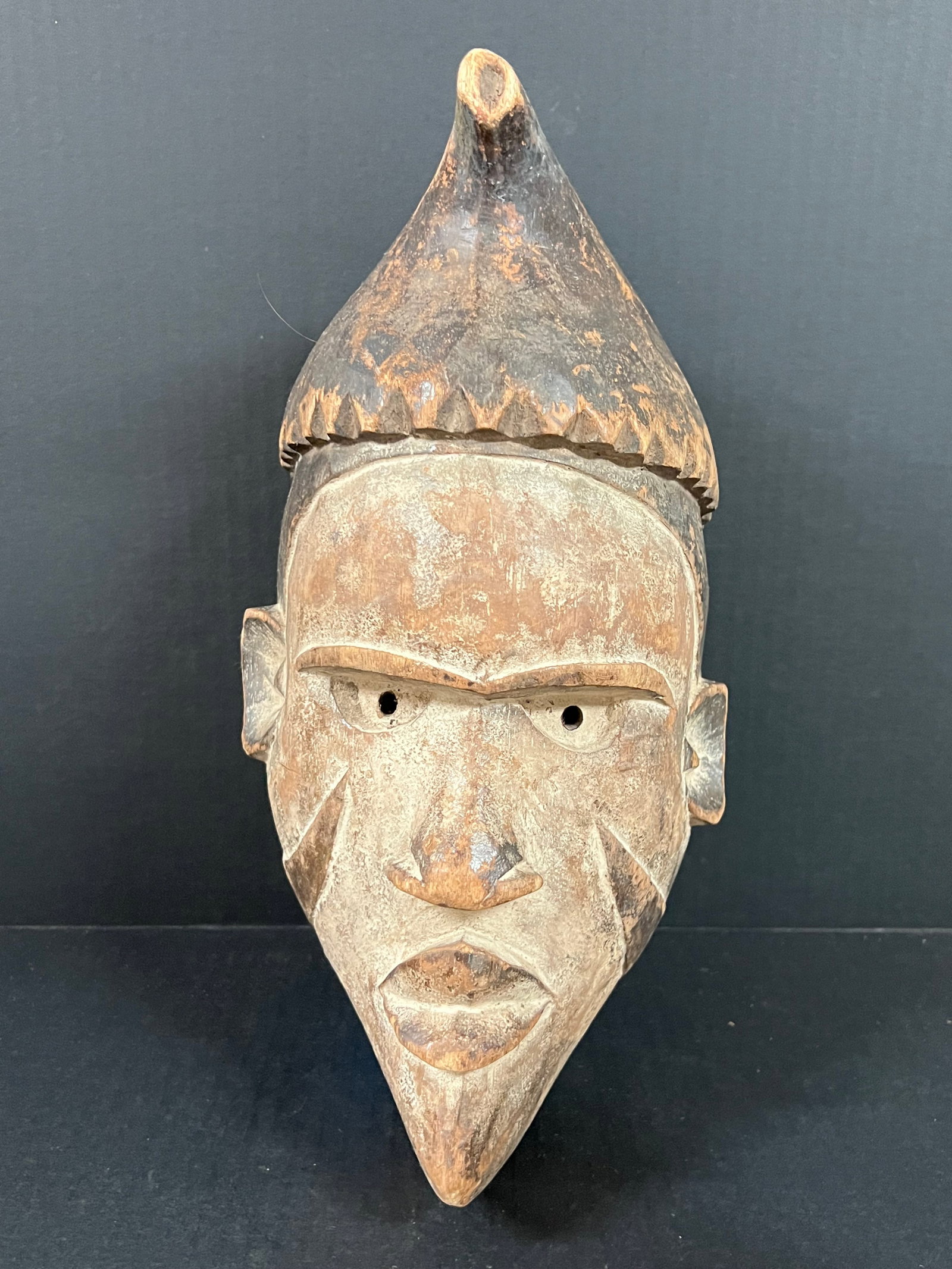 Ibo Mask: African Tribal Art Ibo Mask. The dimension is 13 inches high x 7 inches wide. Please be aware that some of the items are vintage, secondhand, old ages, antiques and may have a defects or sign of