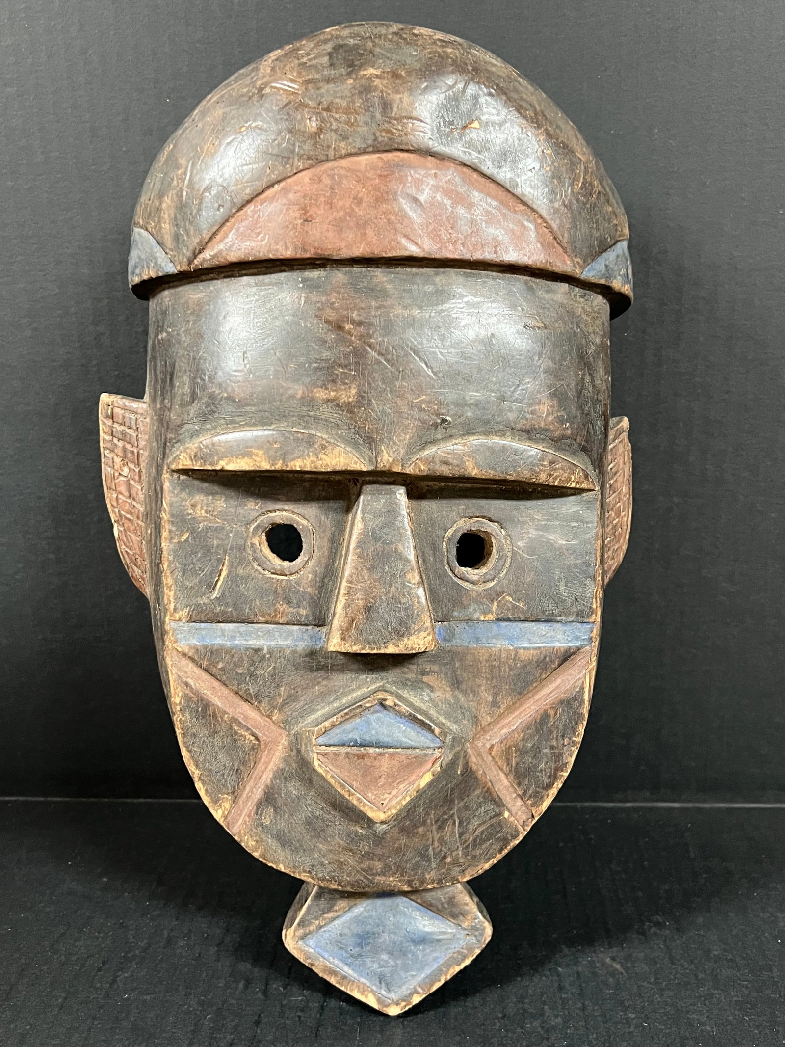 Toma Mask: African Tribal Art Toma Mask. The dimension is 15.5 inches high x 9 inches wide. Please be aware that some of the items are vintage, secondhand, old ages, antiques and may have a defects or sign of ag