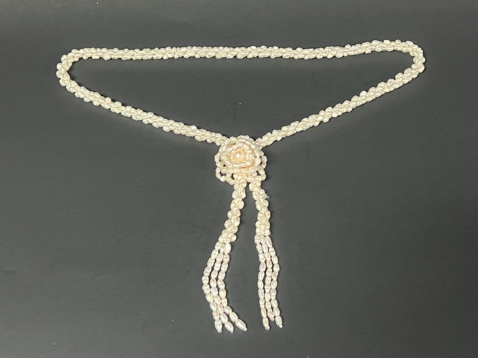 Southeast Asian Freshwater Cultured Pearl Necklace: Southeast Asian freshwater Cultured Rice Shaped Pearl Necklace. The dimension is 16 inches round. Please be aware that some of the items are vintage, secondhand, old ages, antiques and may have a defe
