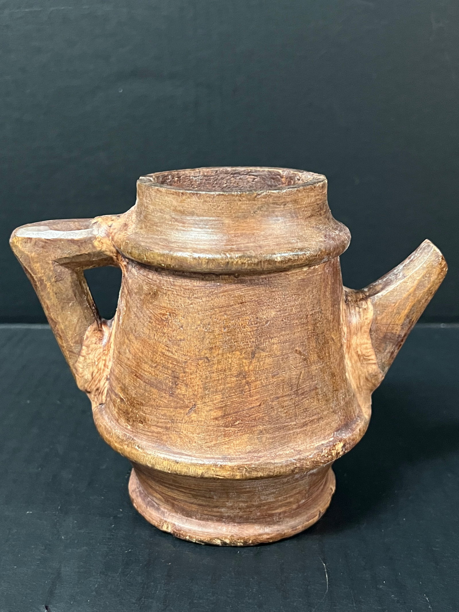 Carved Wood Tea Pot Sculpture: Vintage Folk Art Carved Wood Tea Pot Sculpture. The dimension is 5.5 inches high x 6.5 inches wide. Please be aware that some of the items are vintage, secondhand, old ages, antiques and may have a de