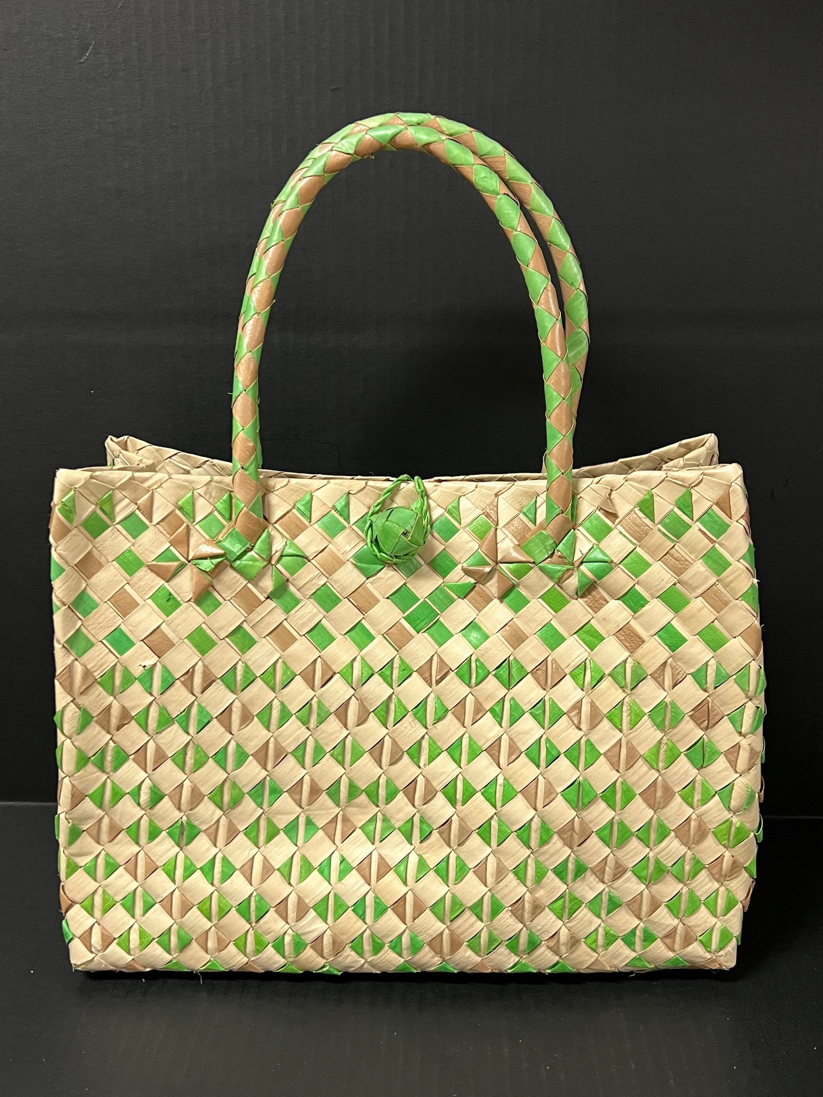 Handwoven Dried Pandan Leaves Handbag: Handwoven Dried Pandan Leaves Handbag. The dimension is 18 inches high x 13 inches wide. Please be aware that some of the items are vintage, secondhand, old ages, antiques and may have a defects or si