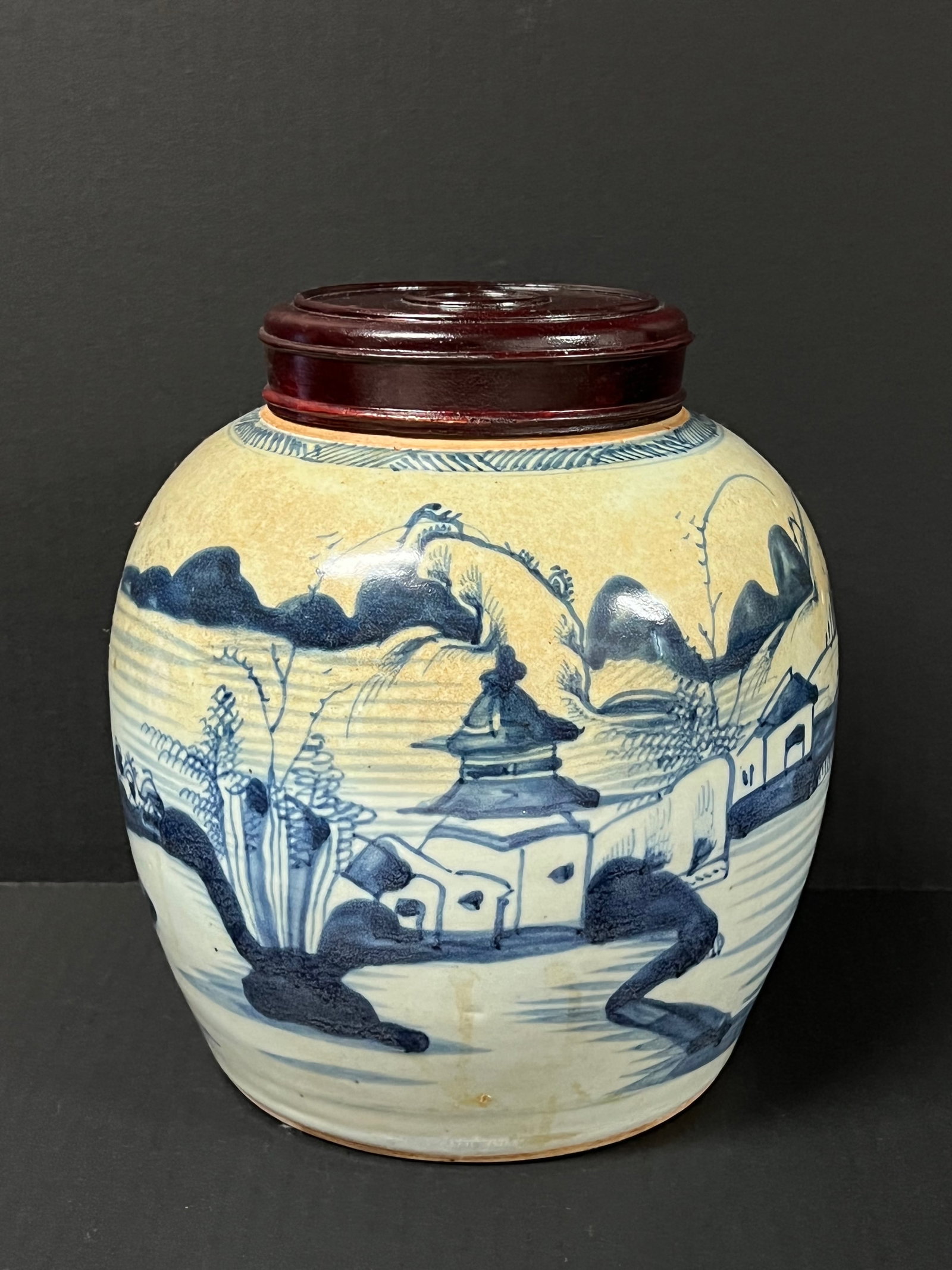 Chinese Art Porcelain Blue and White Jar with Woden Cover: Chinese Art Porcelain Blue and White Jar with Wooden Cover. The dimension is 8 inches high x 8 inches wide. Please be aware that some of the items are vintage, secondhand, old ages, antiques and may h