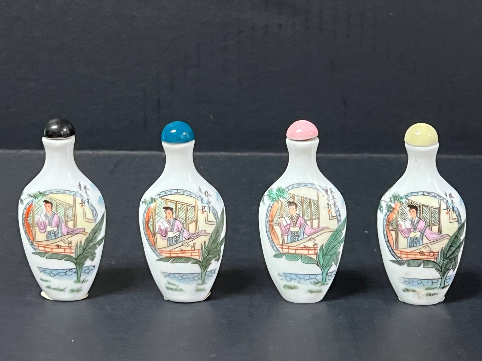 Chinese Art Porcelain Snuff Bottle Lot of 4: Chinese Art Porcelain Snuff Bottle Lot of 4. The dimension is 3 inches high x 2 inches wide. Please be aware that some of the items are vintage, secondhand, old ages, antiques and may have a defects