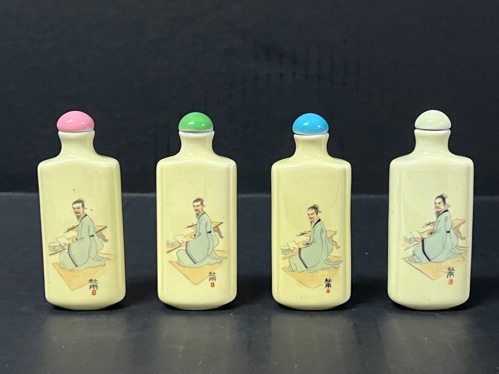 Chinese Art Porcelain Snuff Bottle Lot of 4: Chinese Art Porcelain Snuff Bottle Lot of 4. The dimension is 3 inches high x 2 inches wide. Please be aware that some of the items are vintage, secondhand, old ages, antiques and may have a defects o