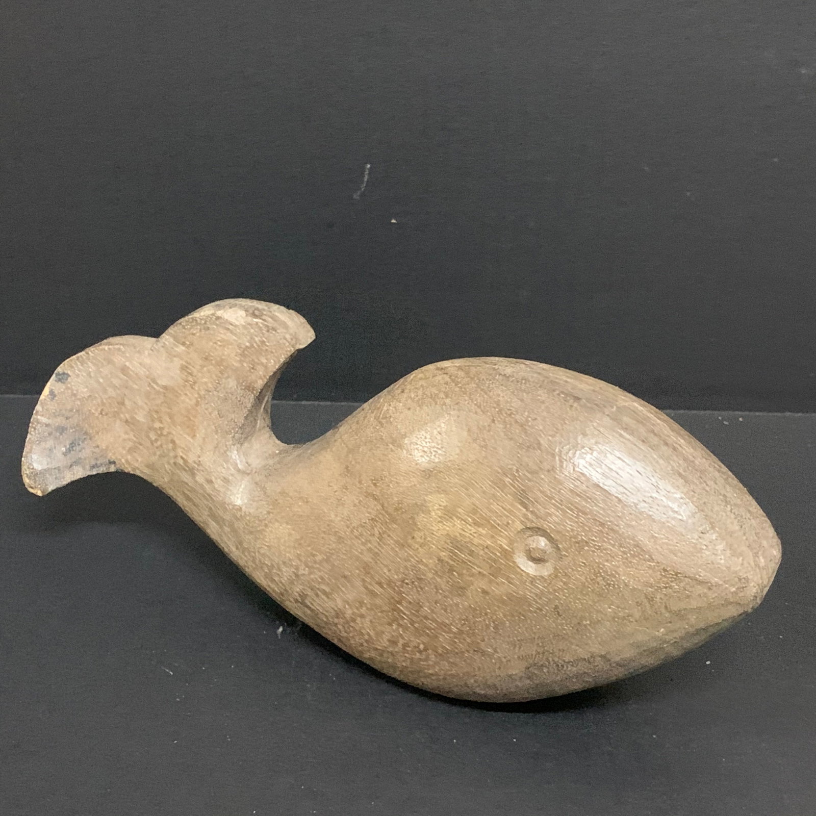 Carved Wood Whale Sculpture: Folk Art Carved Wood Whale Sculpture. The dimension is 5 inches high x 10.5 inches wide. Please be aware that some of the items are vintage, secondhand, old ages, antiques and may have a defects or si
