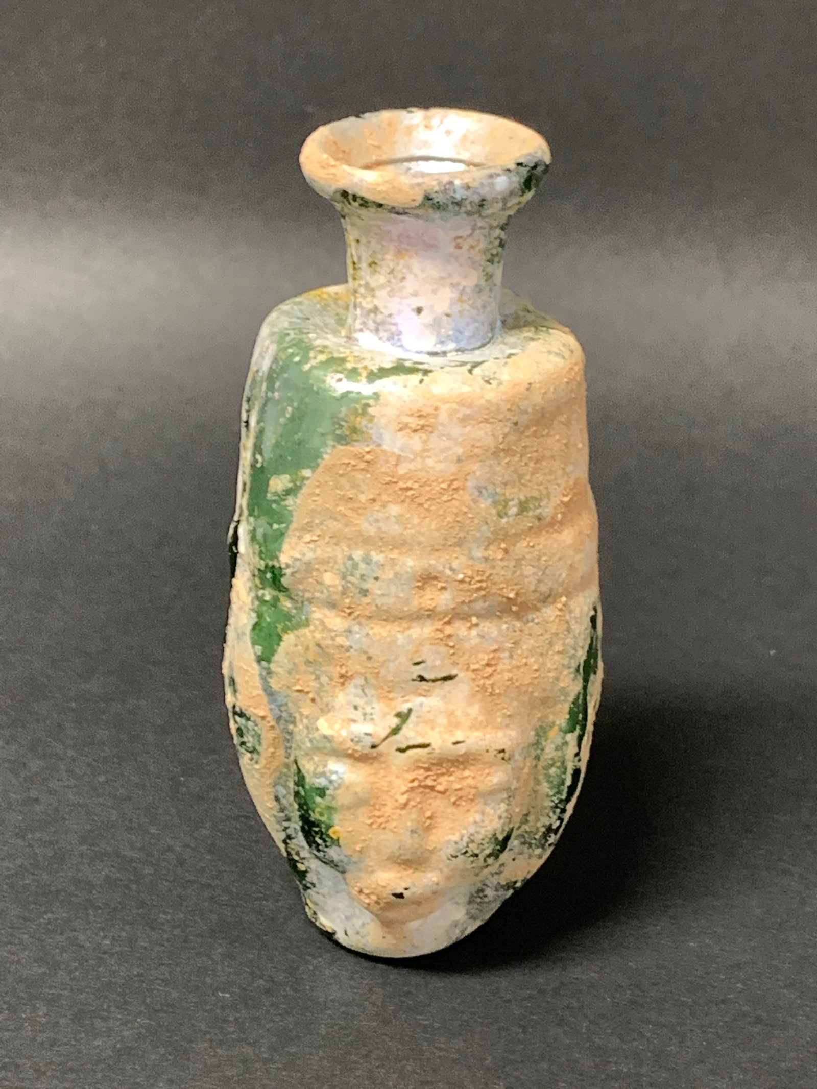 Roman Art Style Glass Bottle: Roman Art Style Glass Bottle. The dimension is 4 inches high x 2 inches wide. Please be aware that some of the items are vintage, secondhand, old ages, antiques and may have a defects or sign of ages,