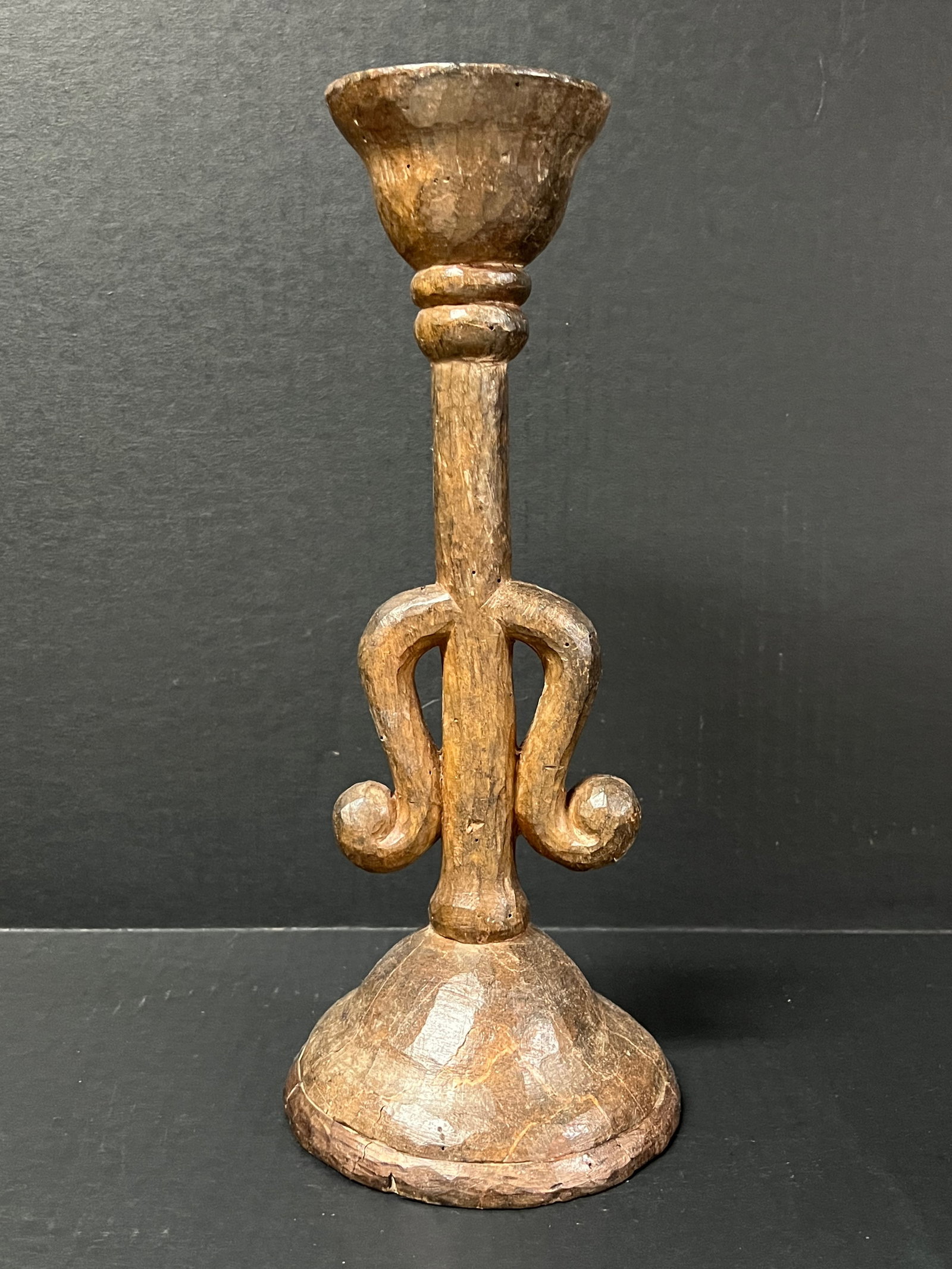 Vintage Hand Carved Wooden Candle Holder Sculpture: Vintage Folk Art Hand Carved Wooden Candle Holder Sculpture. The dimension is 12.25 inches high x 5 inches wide. Please be aware that some of the items are vintage, secondhand, old ages, antiques and