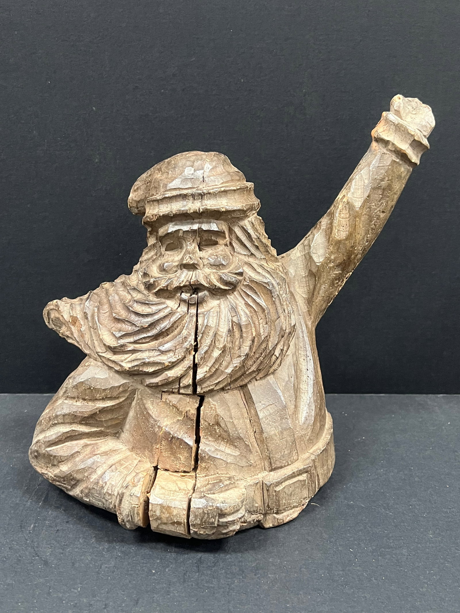 Vintage Hand Carved Wooden Santa Claus Sculpture: Vintage Folk Art Hand Carved Wooden Santa Claus Sculpture. The dimension is 10 inches high x 11 inches wide. Please be aware that some of the items are vintage, secondhand, old ages, antiques and may 