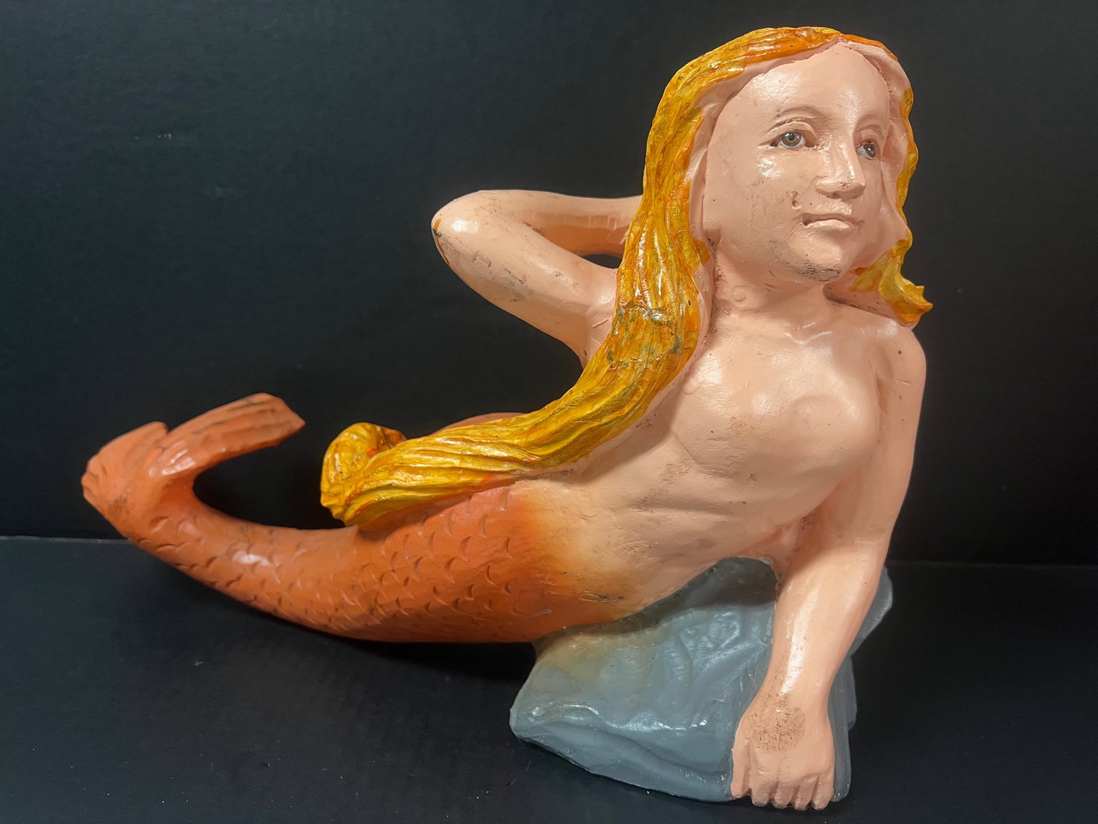 Hand Carved Painted Wooden Mermaid Sculpture with Tali Up: Hand Carved Painted Wooden Mermaid Sculpture with Tail Up. The dimension is 12 inches high x 18 inches wide. Please be aware that some of the items are vintage, secondhand, old ages, antiques and may