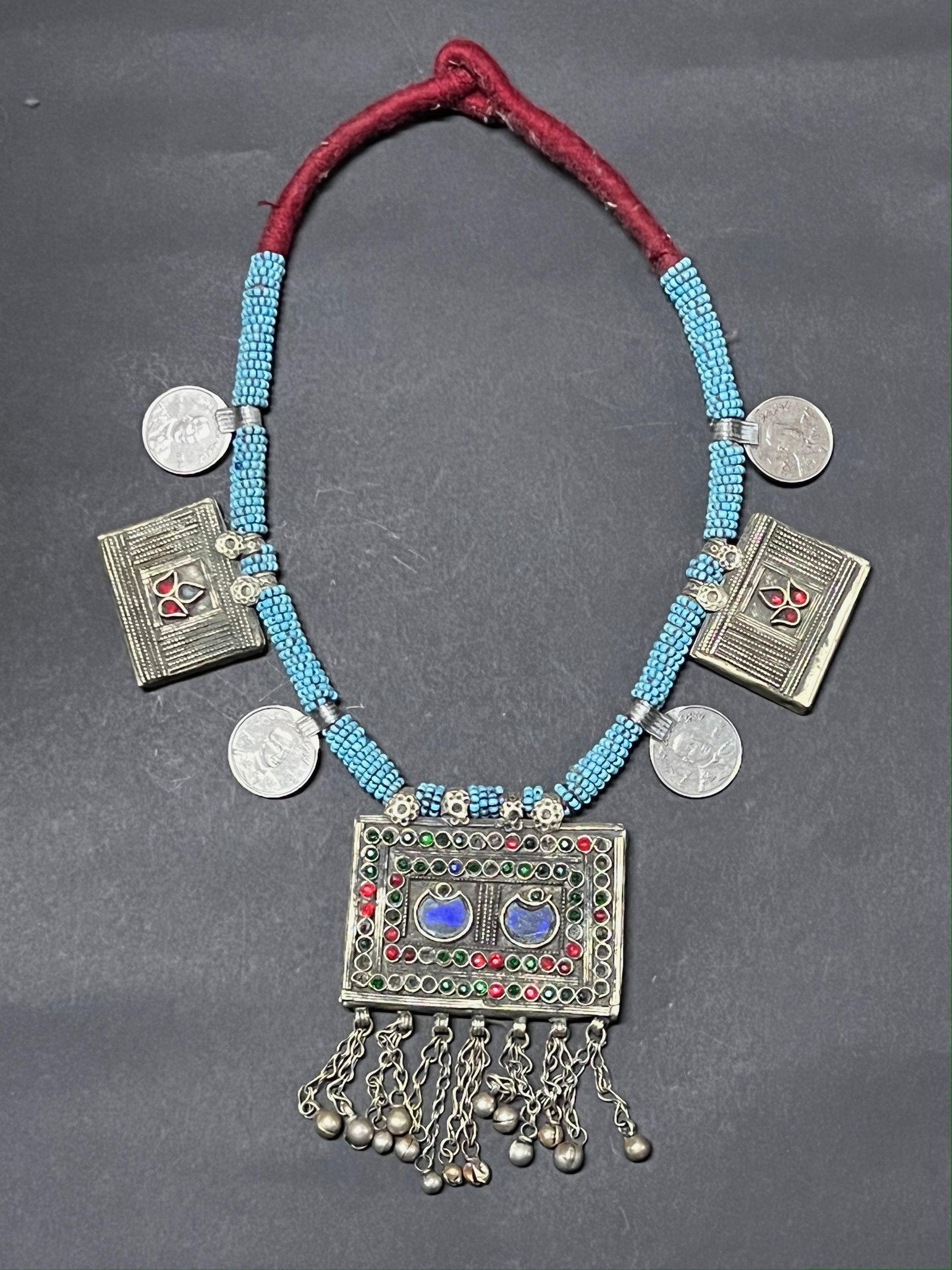 Vintage Handmade Middle Eastern Silver Kuchi Coin and Glass Beads Necklace: Vintage Handmade Middle Eastern Silver Kuchi Coin and Glass beads Necklace. The dimension is 25 inches round. Please be aware that some of the items are vintage, secondhand, old ages, antiques and