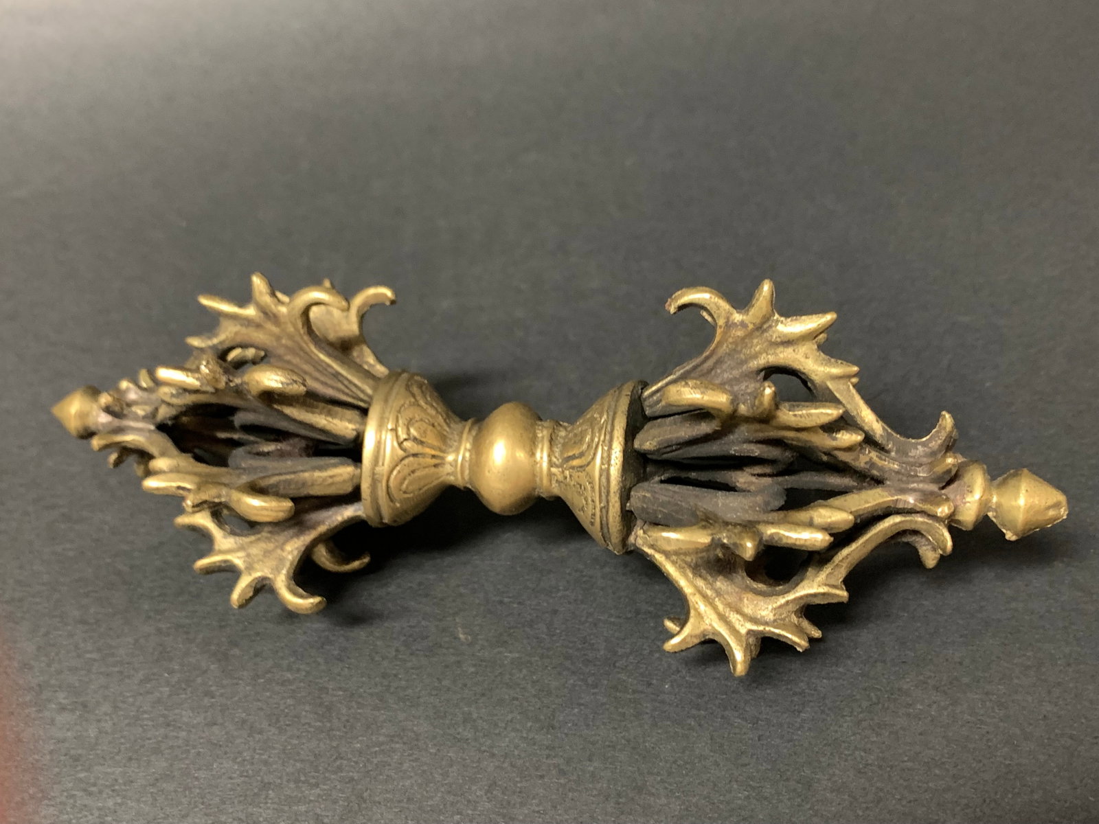Tibetan Art Gilt Bronze Vajra Dorje Phurba Ritual Dagger: Tibetan Art Gilt Bronze Vajra Dorje Phurba Ritual Dagger. The dimension is 6 inches high x 2.5 inches . Please be aware that some of the items are vintage, secondhand, old ages, antiques and may have 
