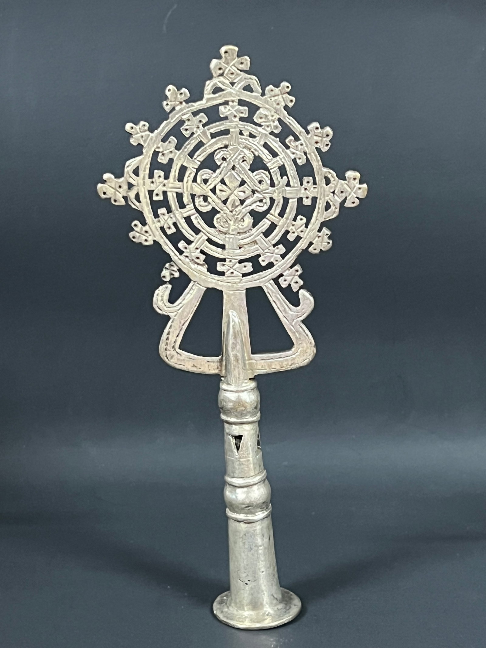 Ethiopian Processional Metal Cross: African Tribal Art Ethiopian Processional Metal Cross. The dimension is 8 inches high x 3.5 inches wide. Please be aware that some of the items are vintage, secondhand, old ages, antiques and may
