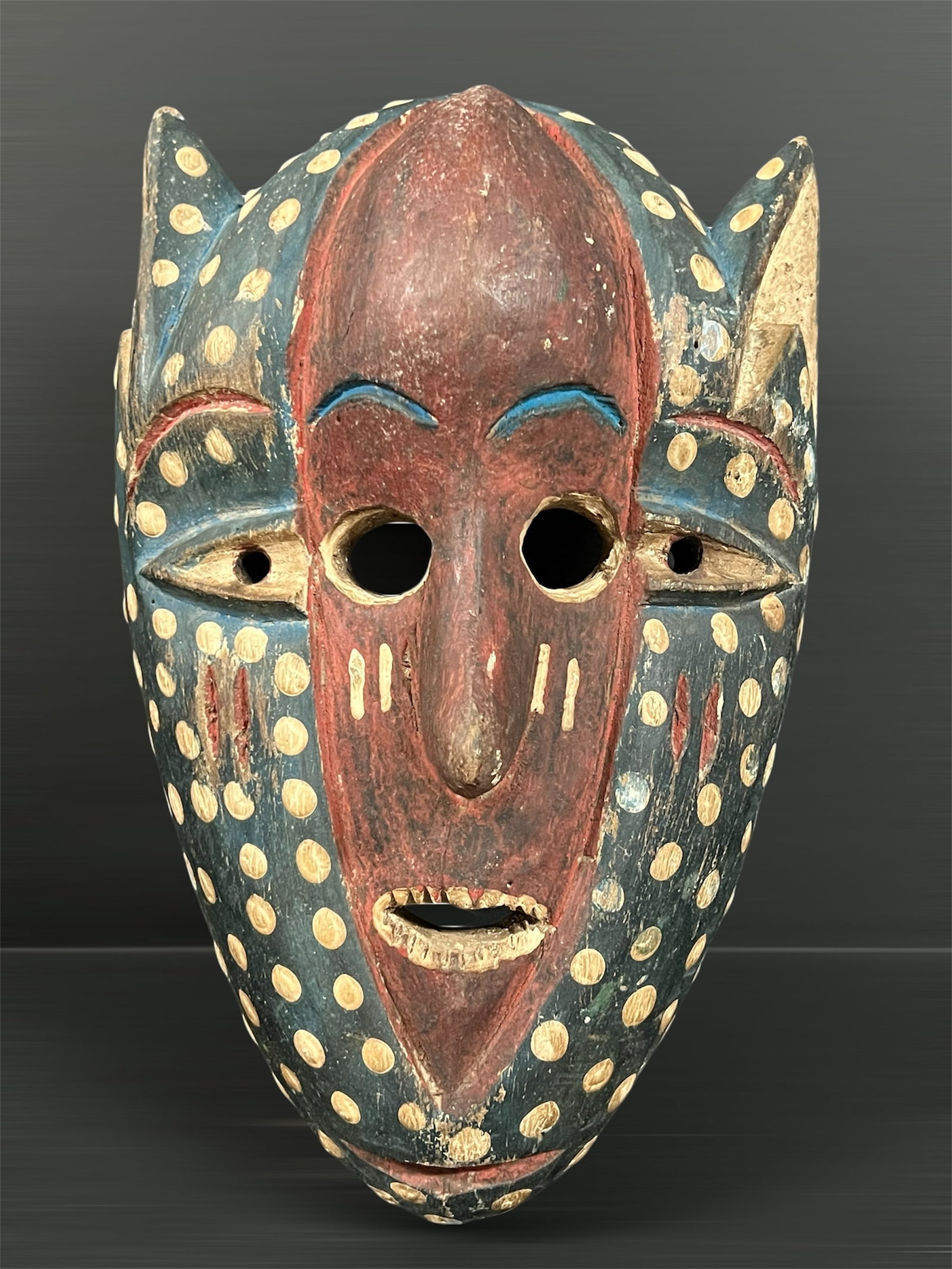 Carved Wood Bozo Mask: African Tribal Art Carved Wood Bozo Mask. The dimension is 13 inches high x 8 inches wide. Please be aware that some of the items are vintage, secondhand, old ages, antiques and may have a defects or 