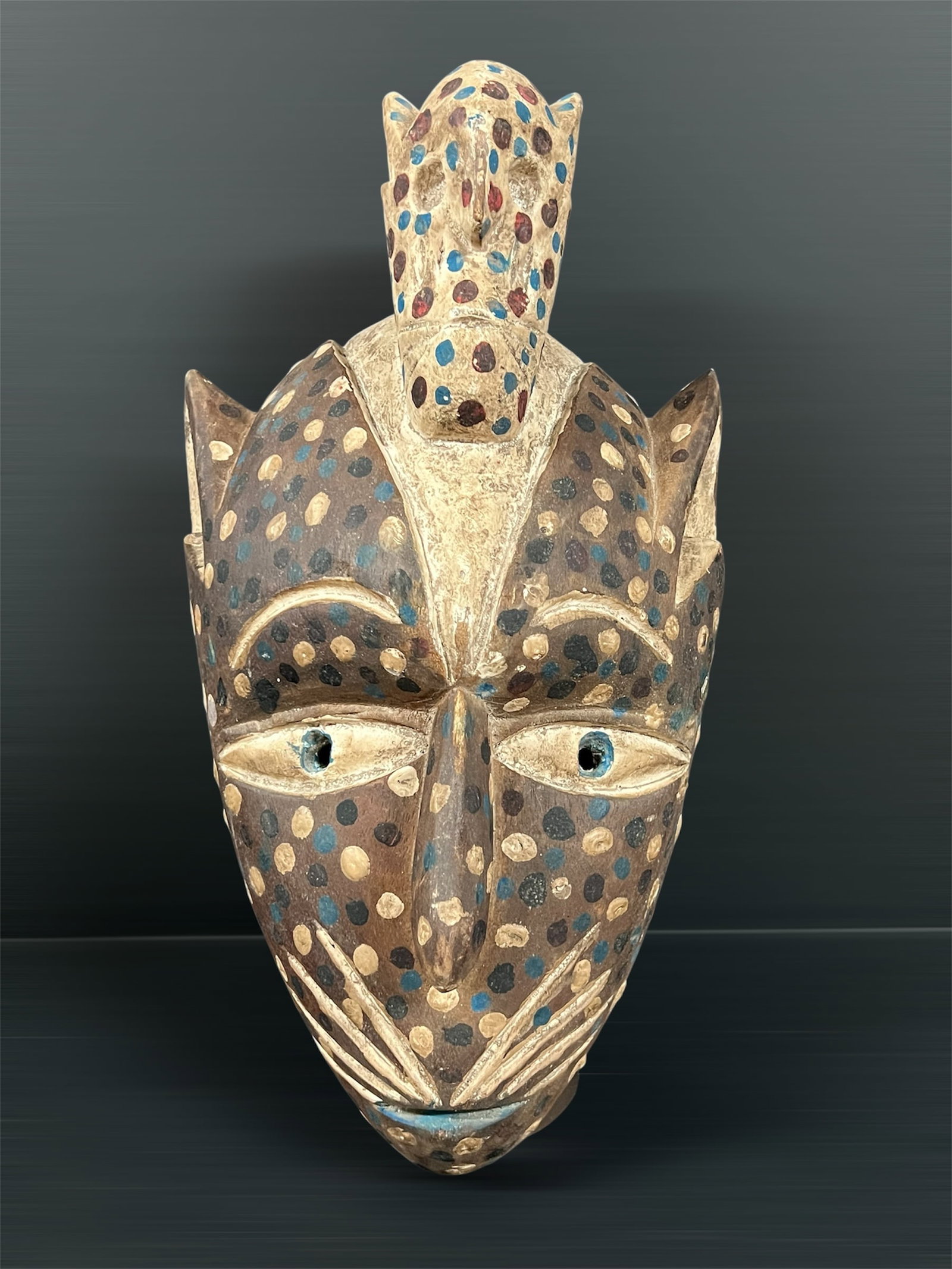 Carved Wood Bozo Mask: African Tribal Art Carved Wood Bozo Mask. The dimension is 16 inches high x 9 inches wide. Please be aware that some of the items are vintage, secondhand, old ages, antiques and may have a defects or 