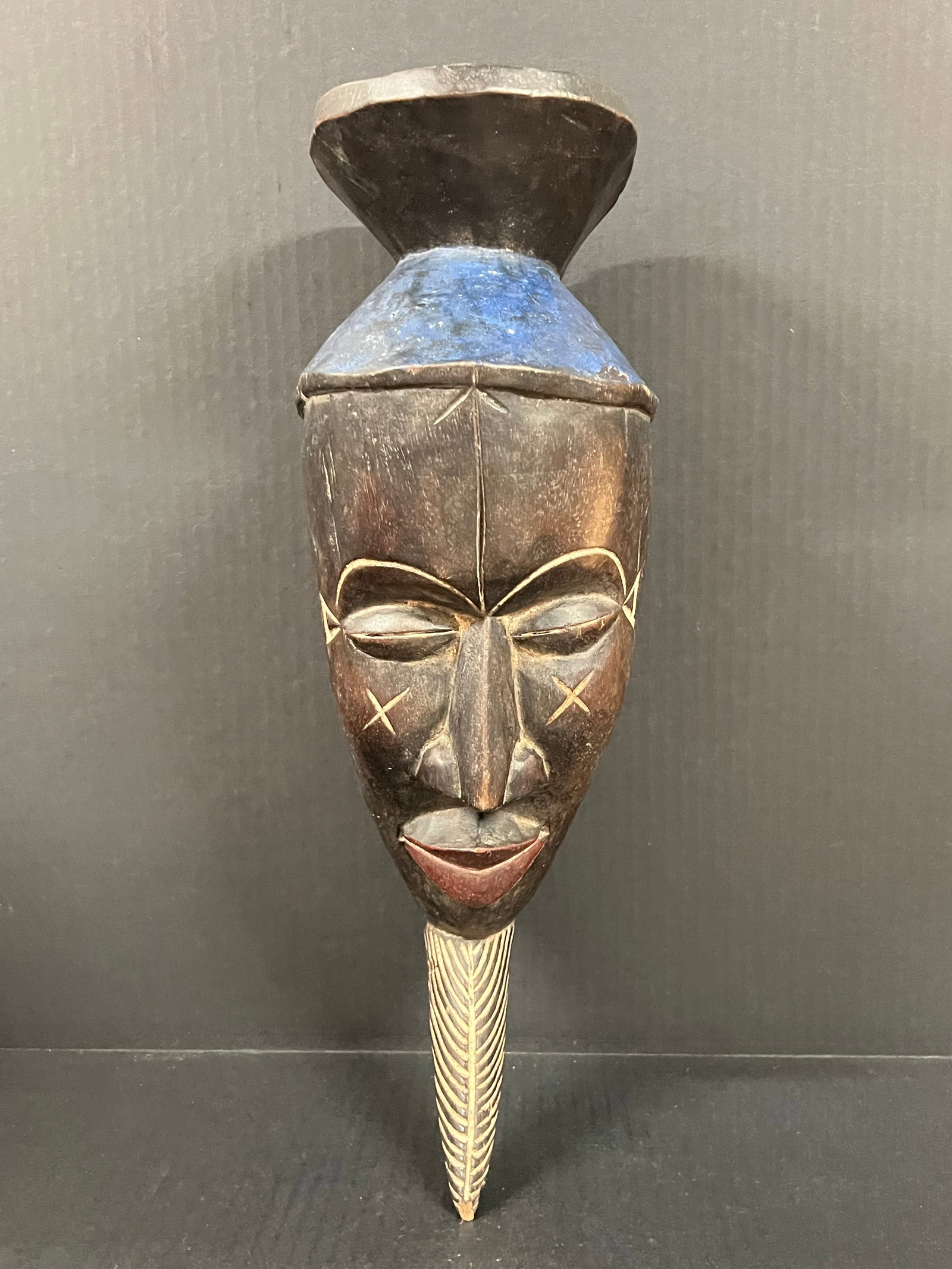 Carved Wood Bacongo Mask: African Tribal Art Carved Wood Bacongo Mask The dimension is 18 inches high x 7 inches wide. Please be aware that some of the items are vintage, secondhand, old ages, antiques and may have a defects o
