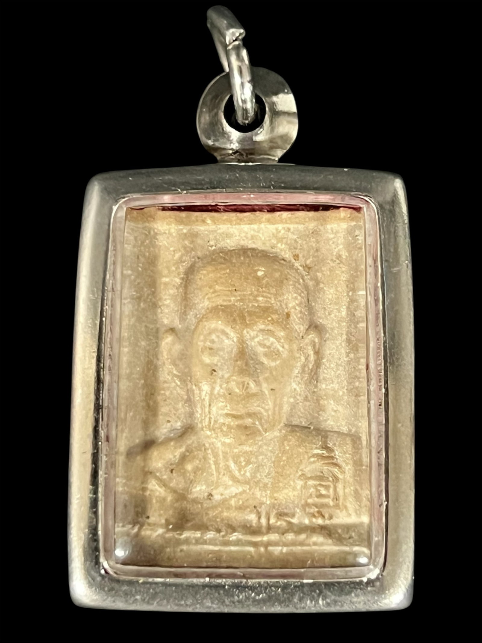 Thai Clay Buddha Amulet Charm Pendant: Thai Clay Buddha Amulet Charm Pendant. The dimension is 1 inches high x 1 inches wide. Please be aware that some of the items are vintage, secondhand, old ages, antiques and may have a defects or sign